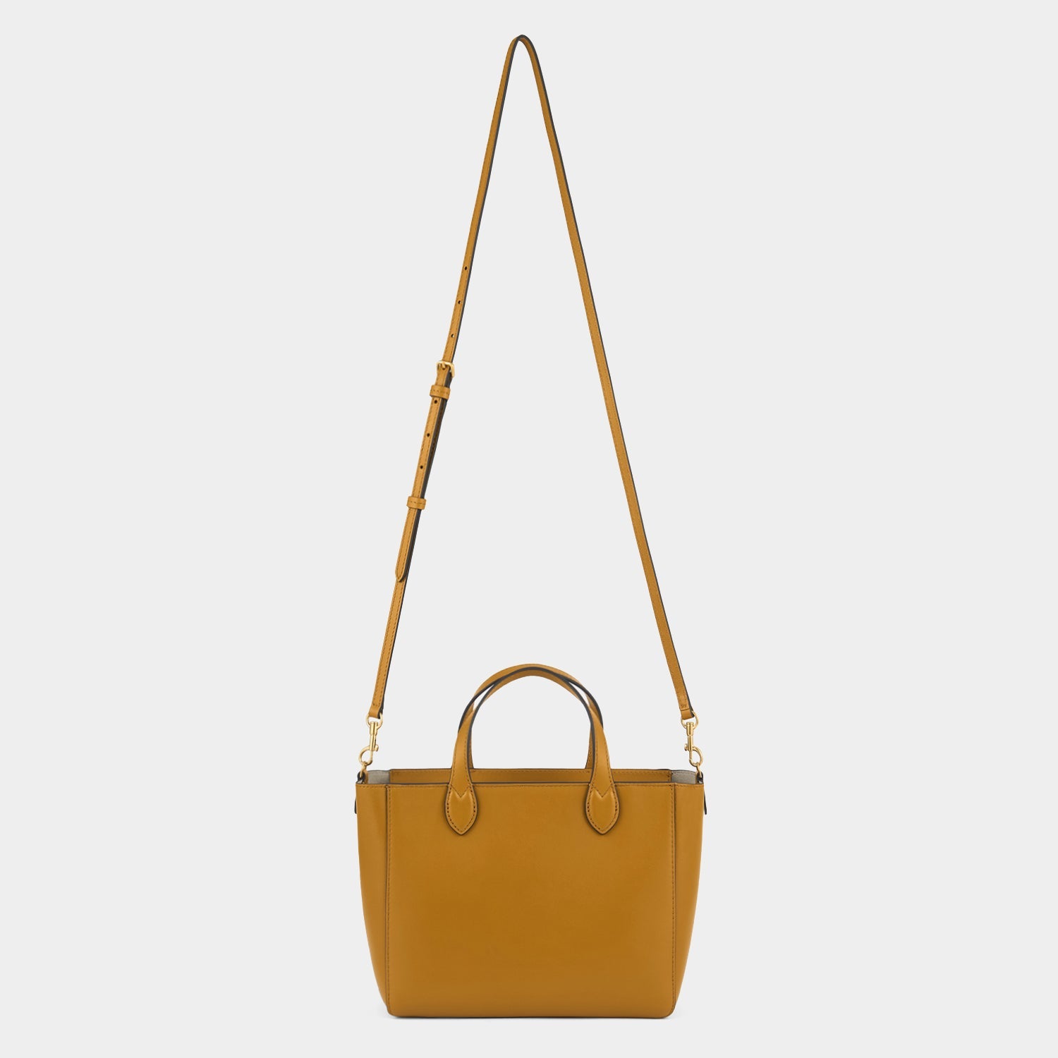 Nevis XS Tote -

          
            Smooth Leather in Tumeric -
          

          Anya Hindmarch EU
