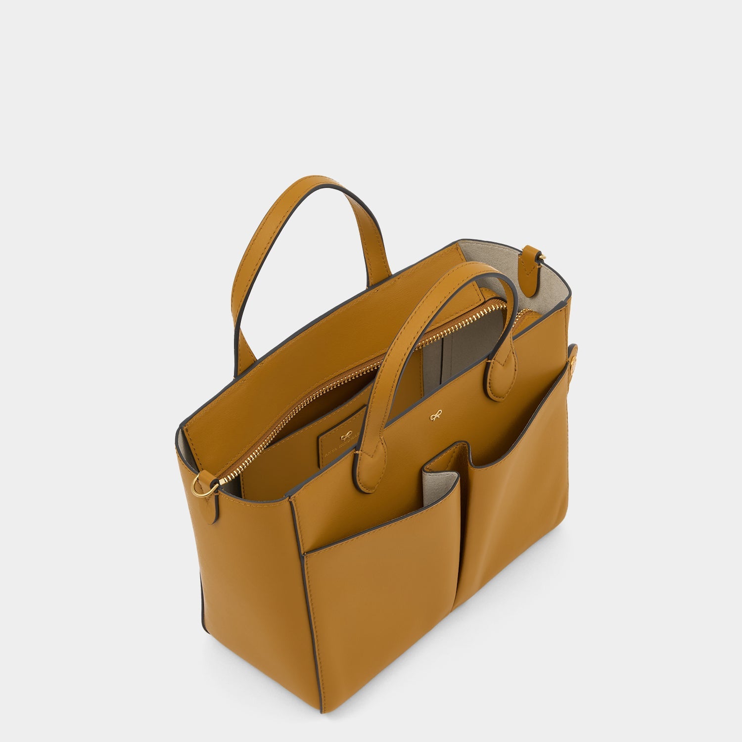 Nevis XS Tote -

          
            Smooth Leather in Tumeric -
          

          Anya Hindmarch EU
