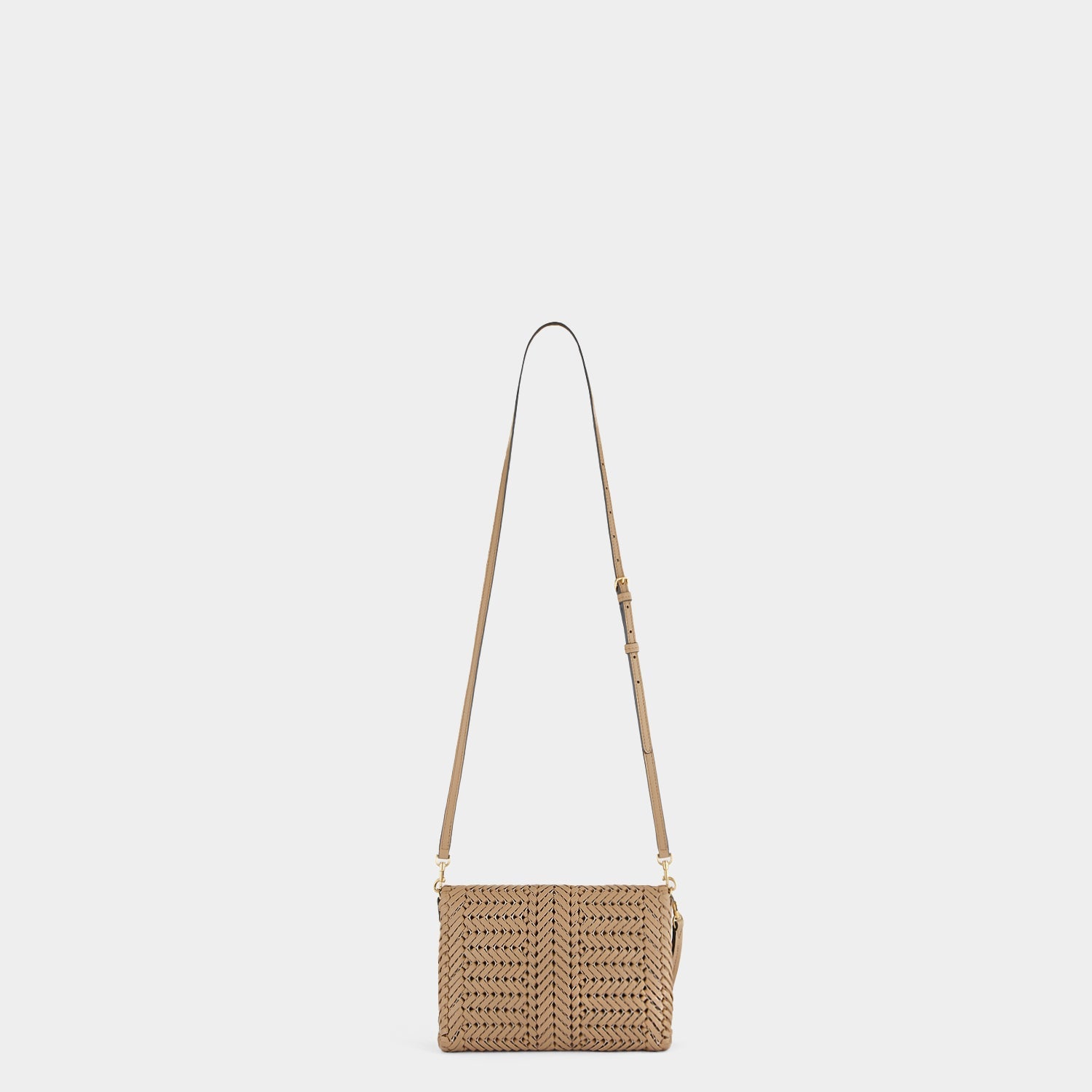 Neeson Cross-body -

          
            Capra Leather in Sand -
          

          Anya Hindmarch EU
