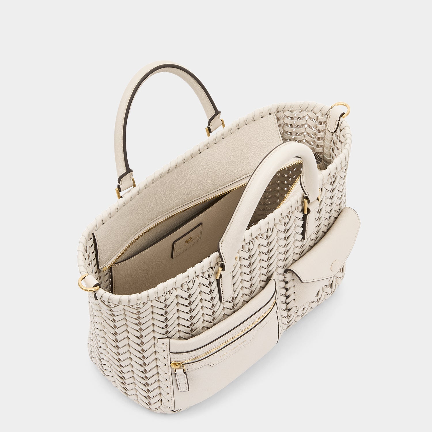 Neeson Pocket Small Cross-body Tote -

          
            Capra Leather in Chalk -
          

          Anya Hindmarch EU
