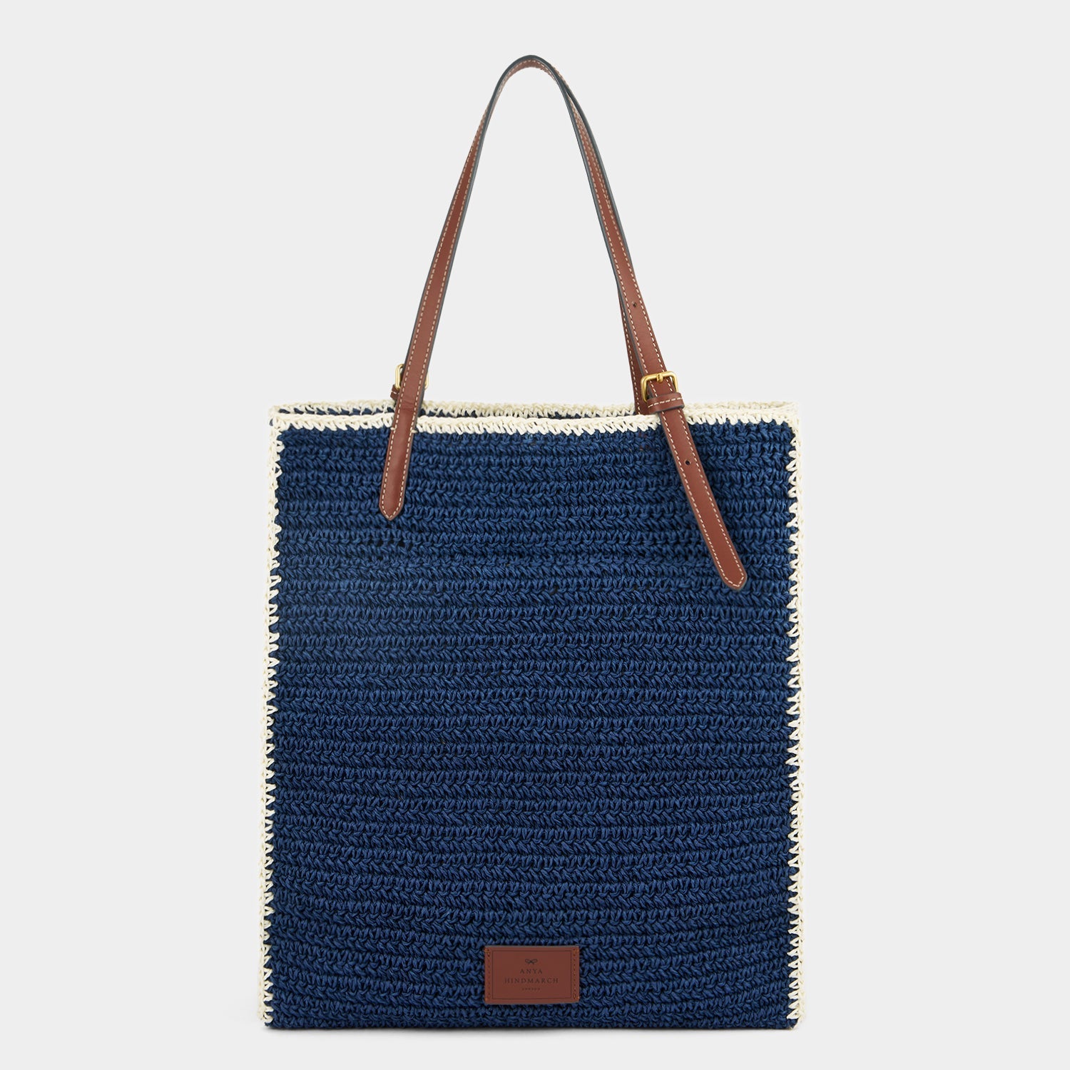 Anya Brands Ever Ready Raffia Tote -

          
            Paper Raffia in Dark Blue -
          

          Anya Hindmarch EU
