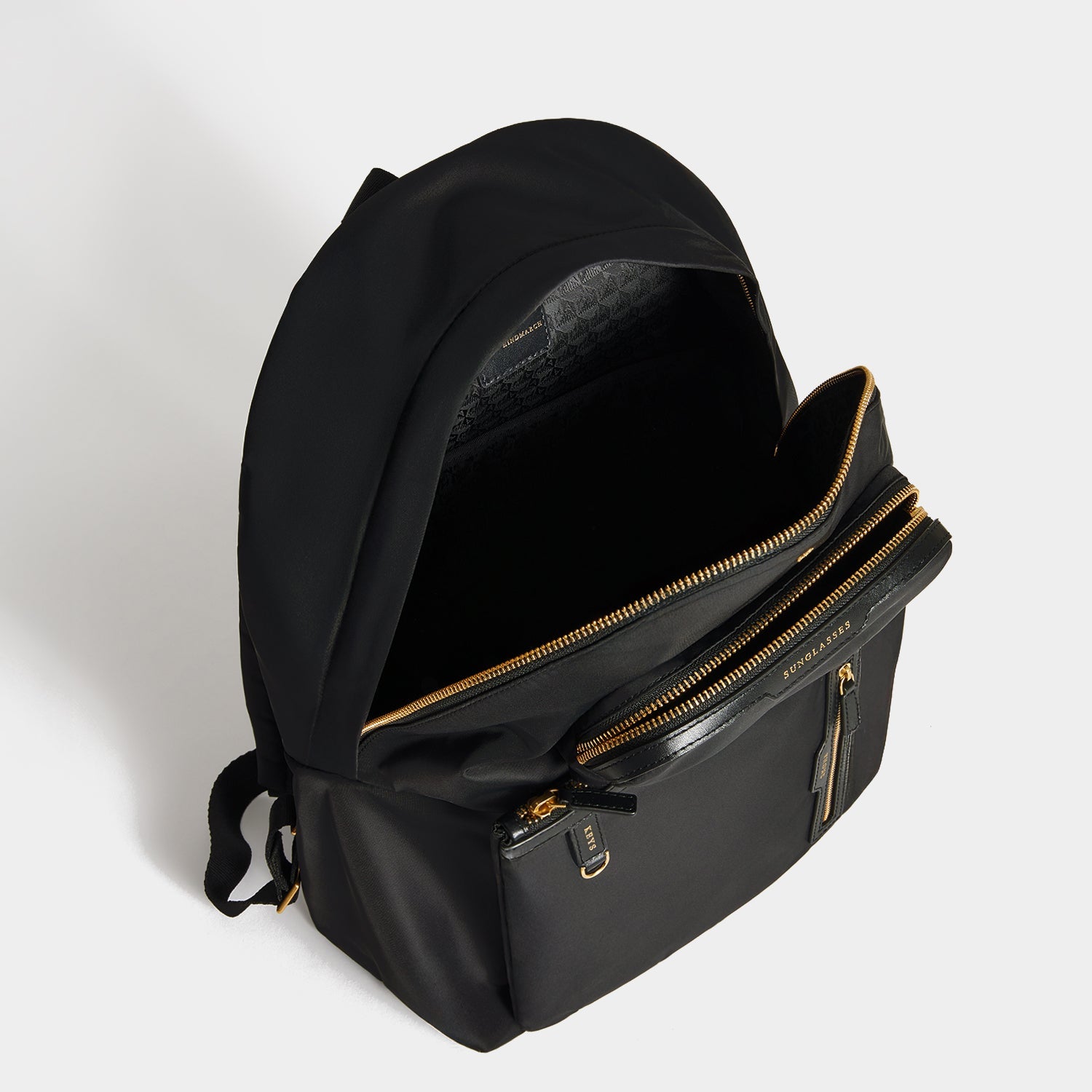 Multi Pocket Backpack -

          
            Regenerated ECONYL® in Black -
          

          Anya Hindmarch EU
