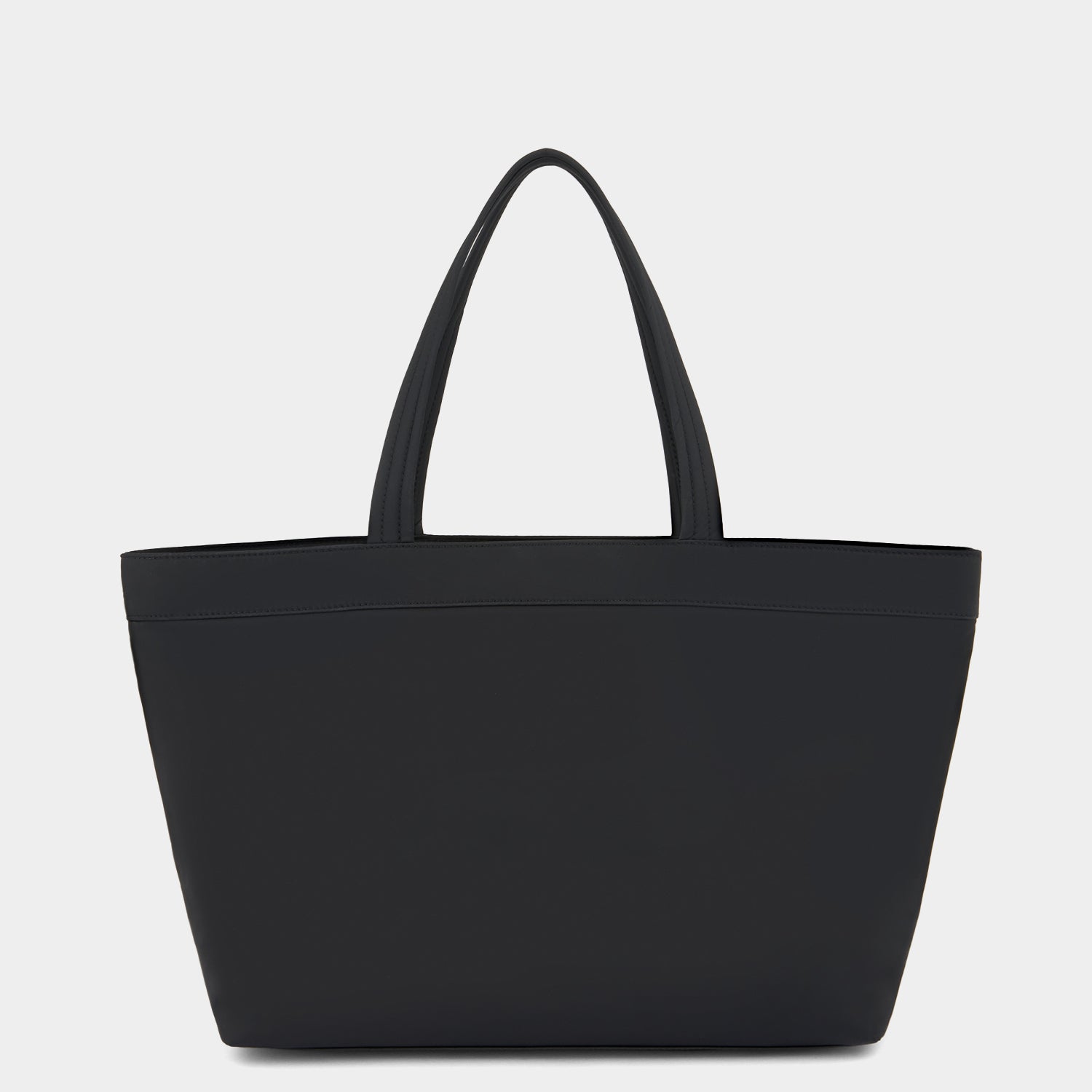 E/W Multi Pocket Tote -

                  
                    Regenerated ECONYL® in Black -
                  

                  Anya Hindmarch EU
