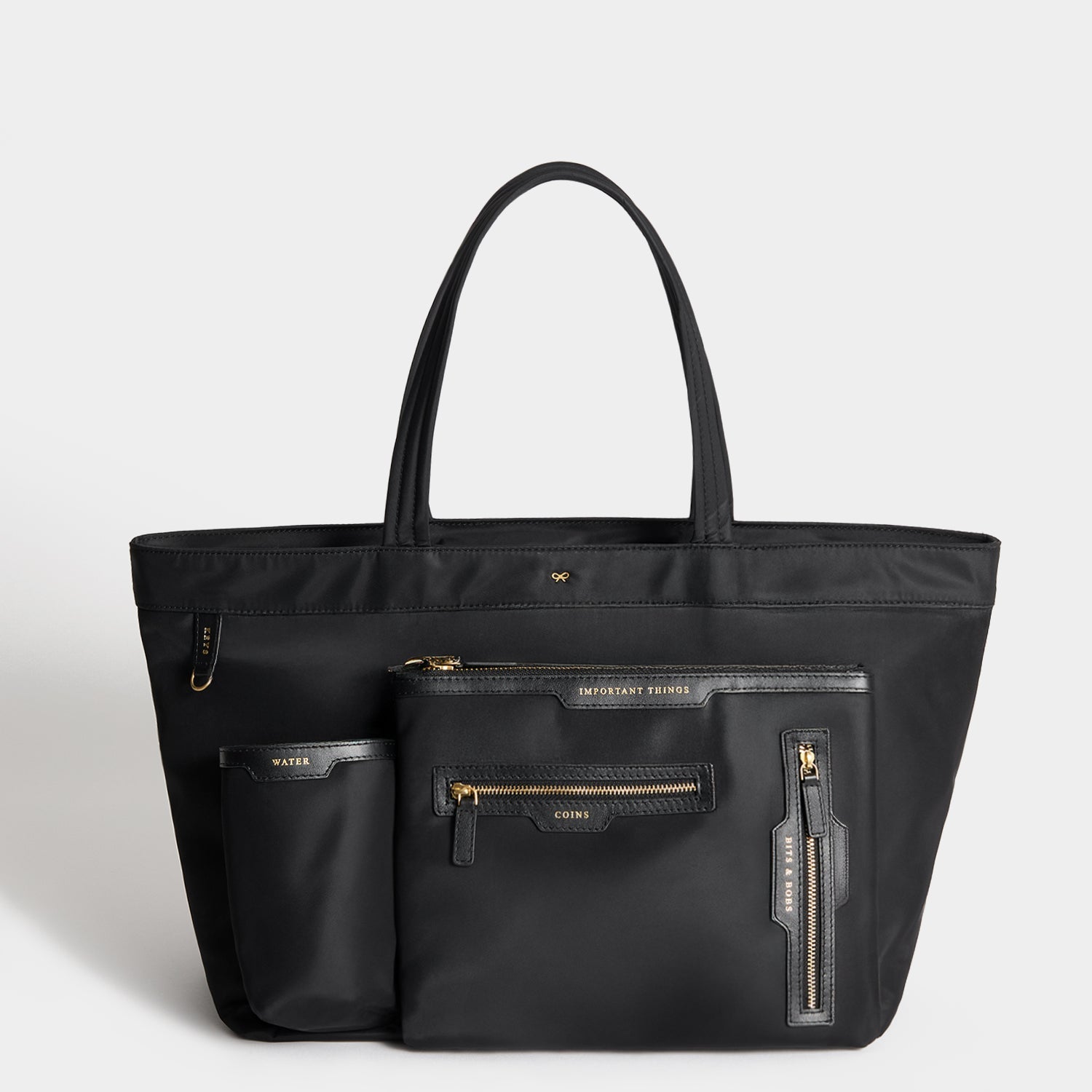 E/W Multi Pocket Tote -

          
            Regenerated ECONYL® in Black -
          

          Anya Hindmarch EU
