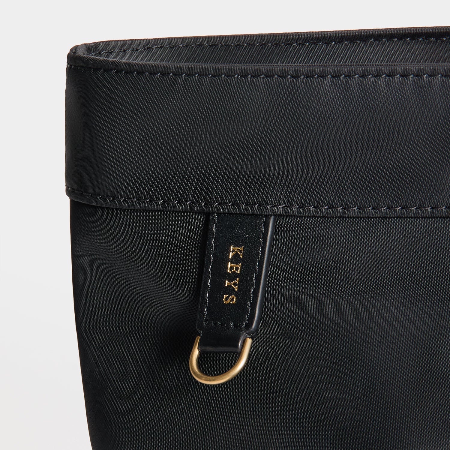 E/W Multi Pocket Tote -

          
            Regenerated ECONYL® in Black -
          

          Anya Hindmarch EU
