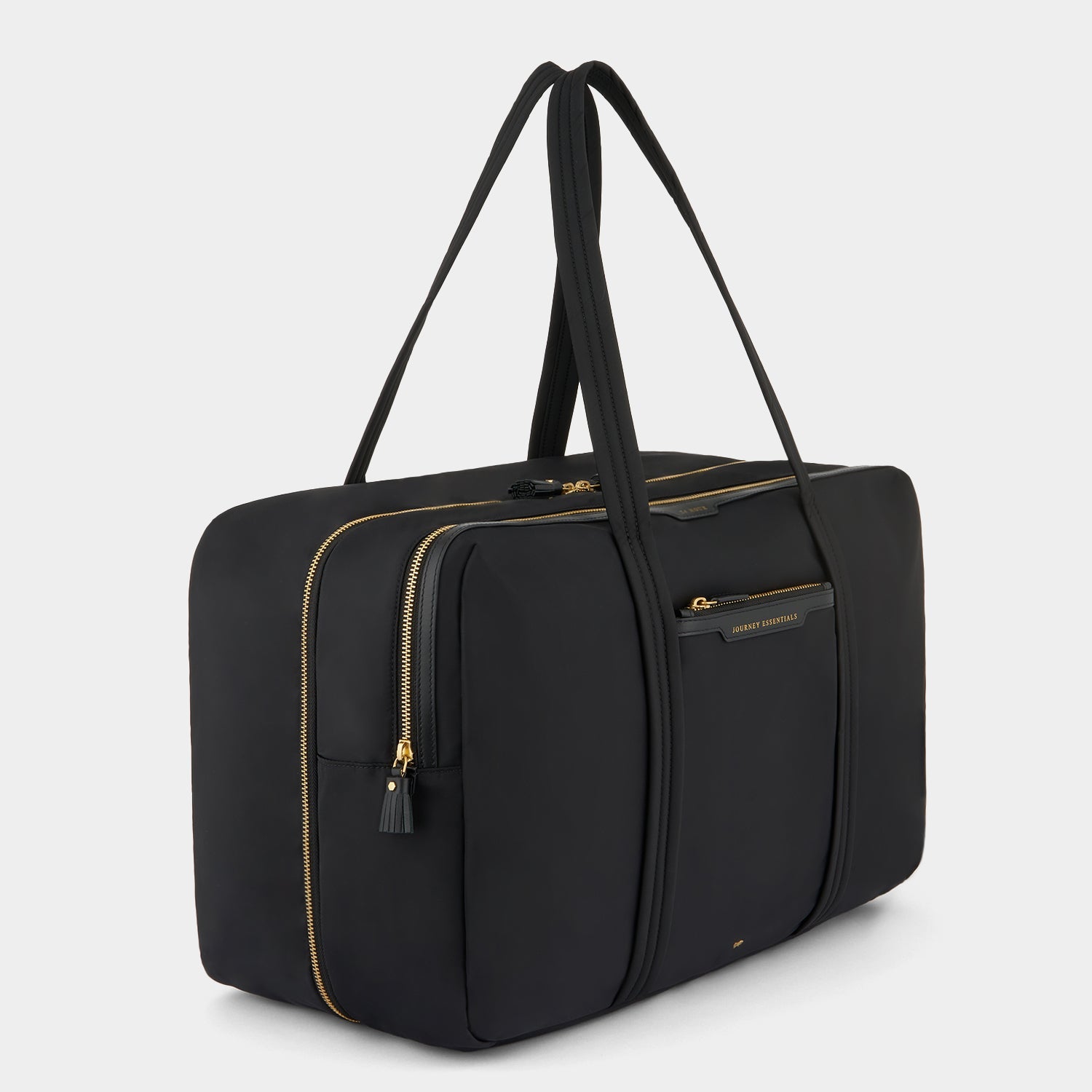 24 Hour Travel Bag -

          
            Regenerated ECONYL® in Black -
          

          Anya Hindmarch EU
