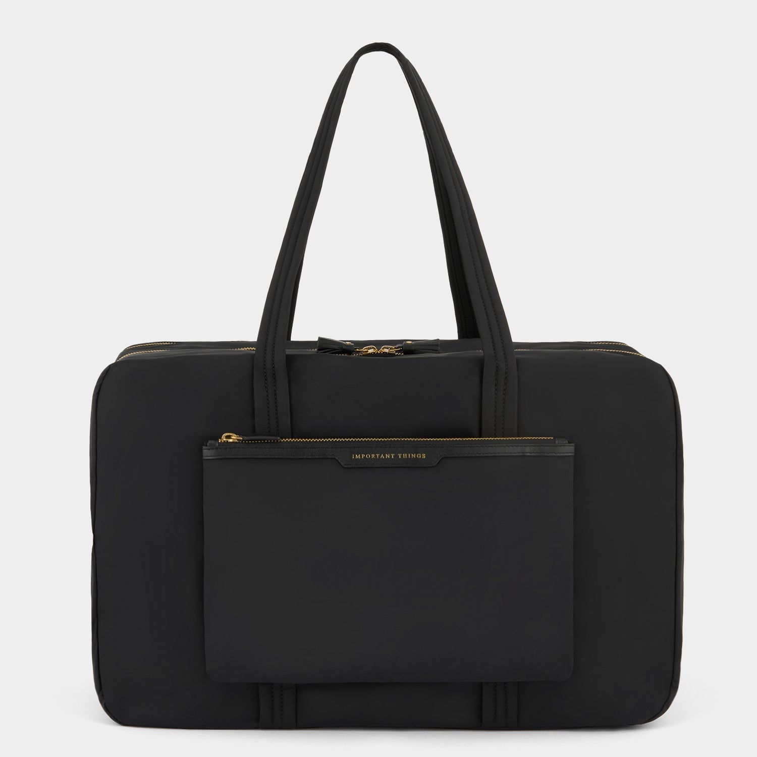 24 Hour Travel Bag -

          
            Regenerated ECONYL® in Black -
          

          Anya Hindmarch EU
