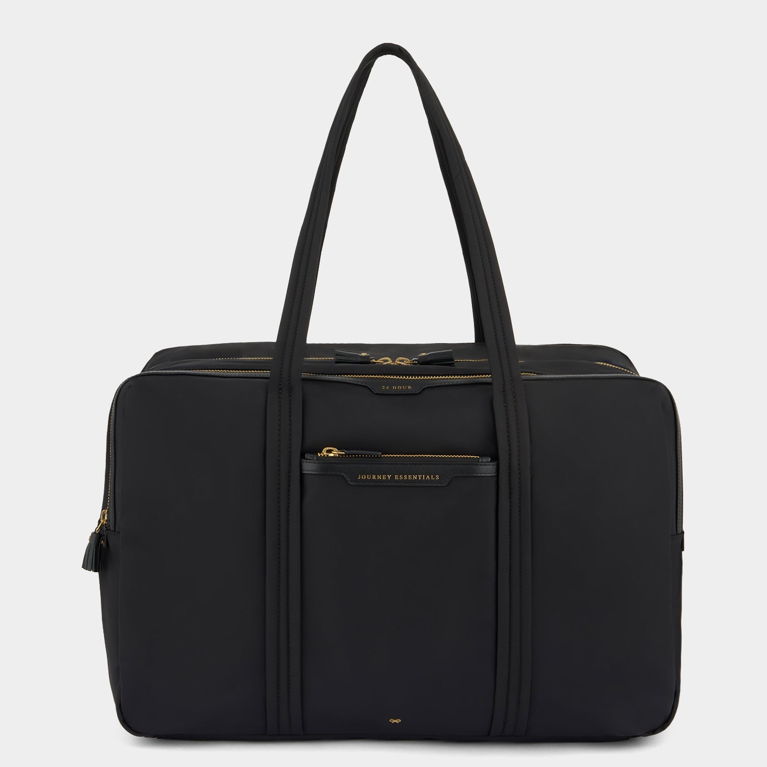 24 Hour Travel Bag -

          
            Regenerated ECONYL® in Black -
          

          Anya Hindmarch EU
