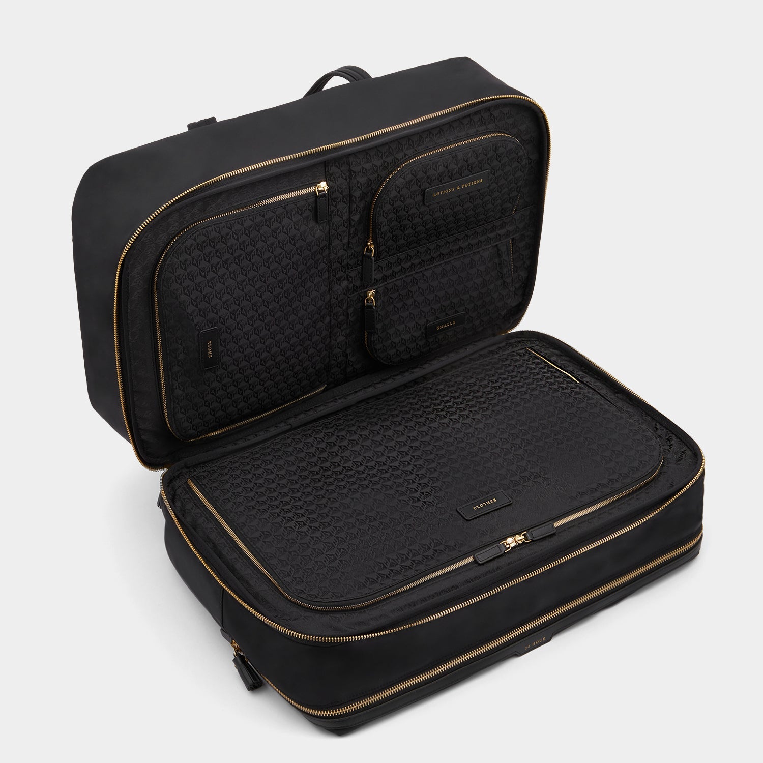 24 Hour Travel Bag -

          
            Regenerated ECONYL® in Black -
          

          Anya Hindmarch EU
