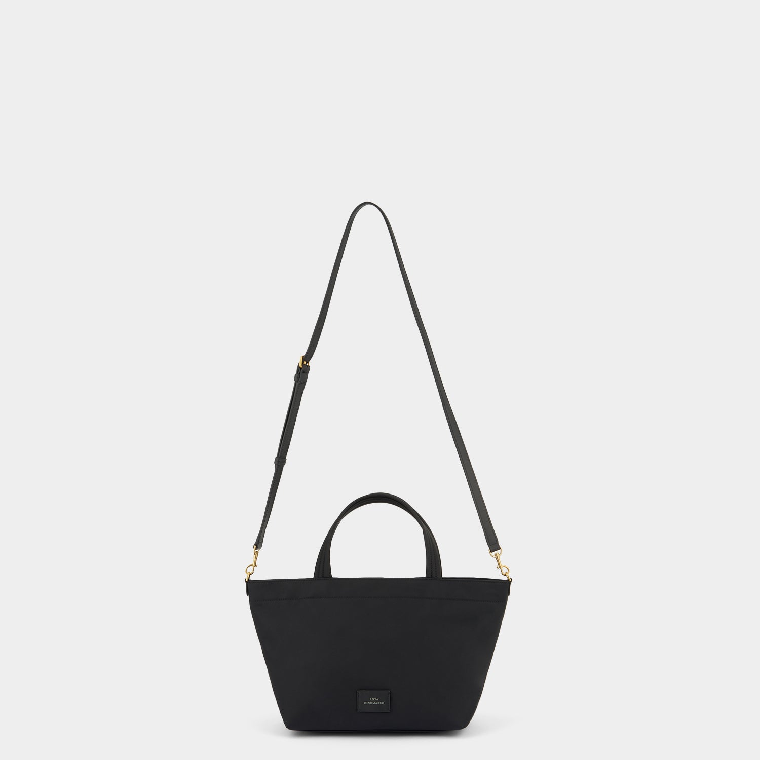 E/W Eyes Mini Cross-body Tote -

          
            Regenerated ECONYL® in Black -
          

          Anya Hindmarch EU
