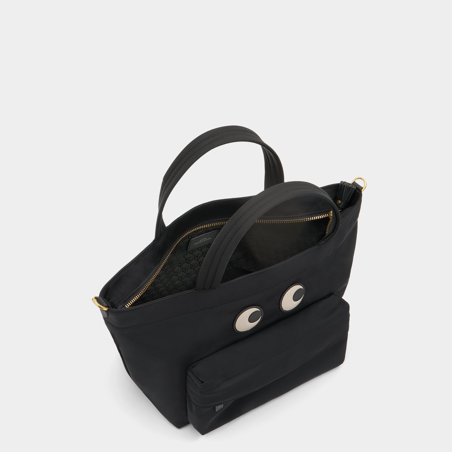 E/W Eyes Mini Cross-body Tote -

          
            Regenerated ECONYL® in Black -
          

          Anya Hindmarch EU
