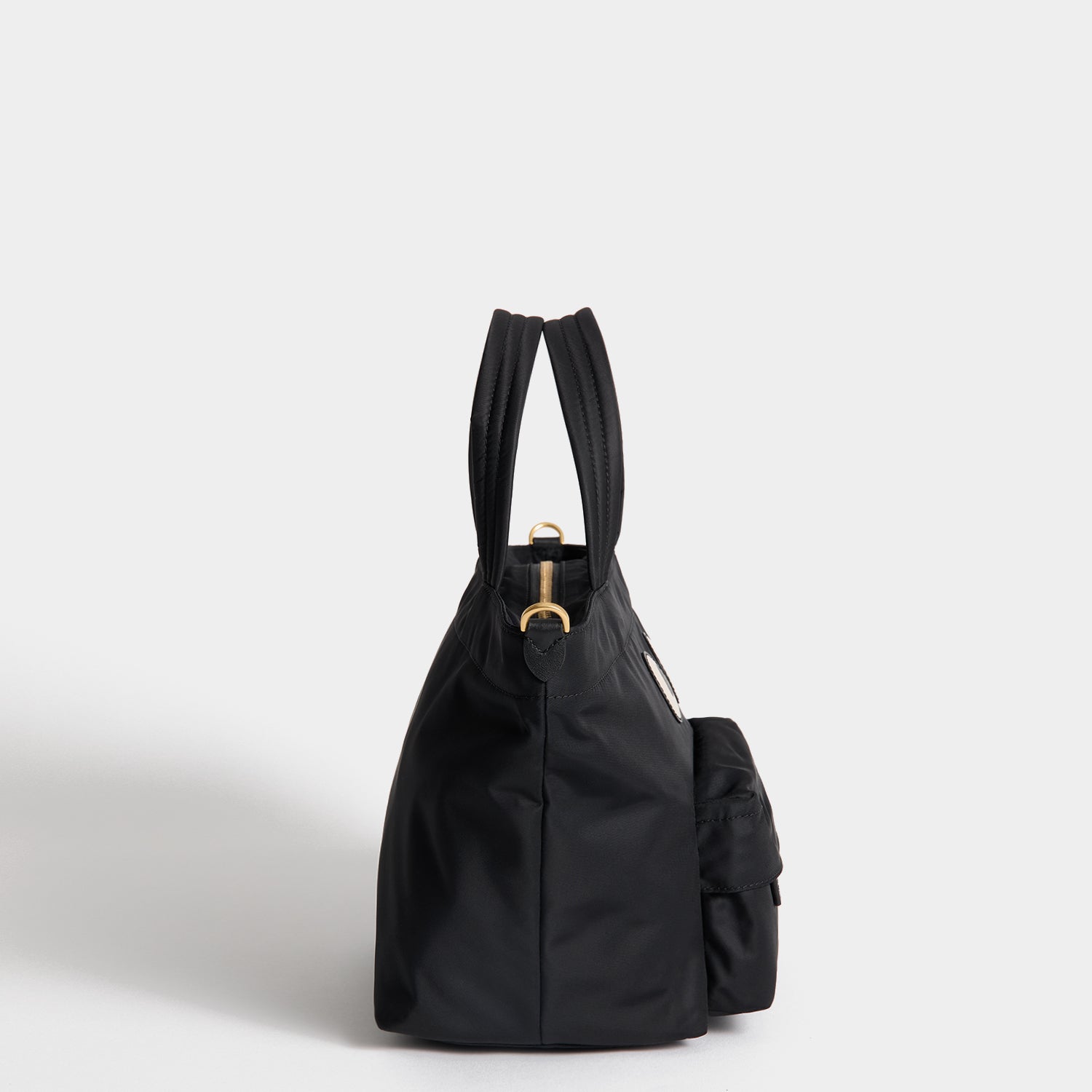 E/W Eyes Mini Cross-body Tote -

          
            Regenerated ECONYL® in Black -
          

          Anya Hindmarch EU
