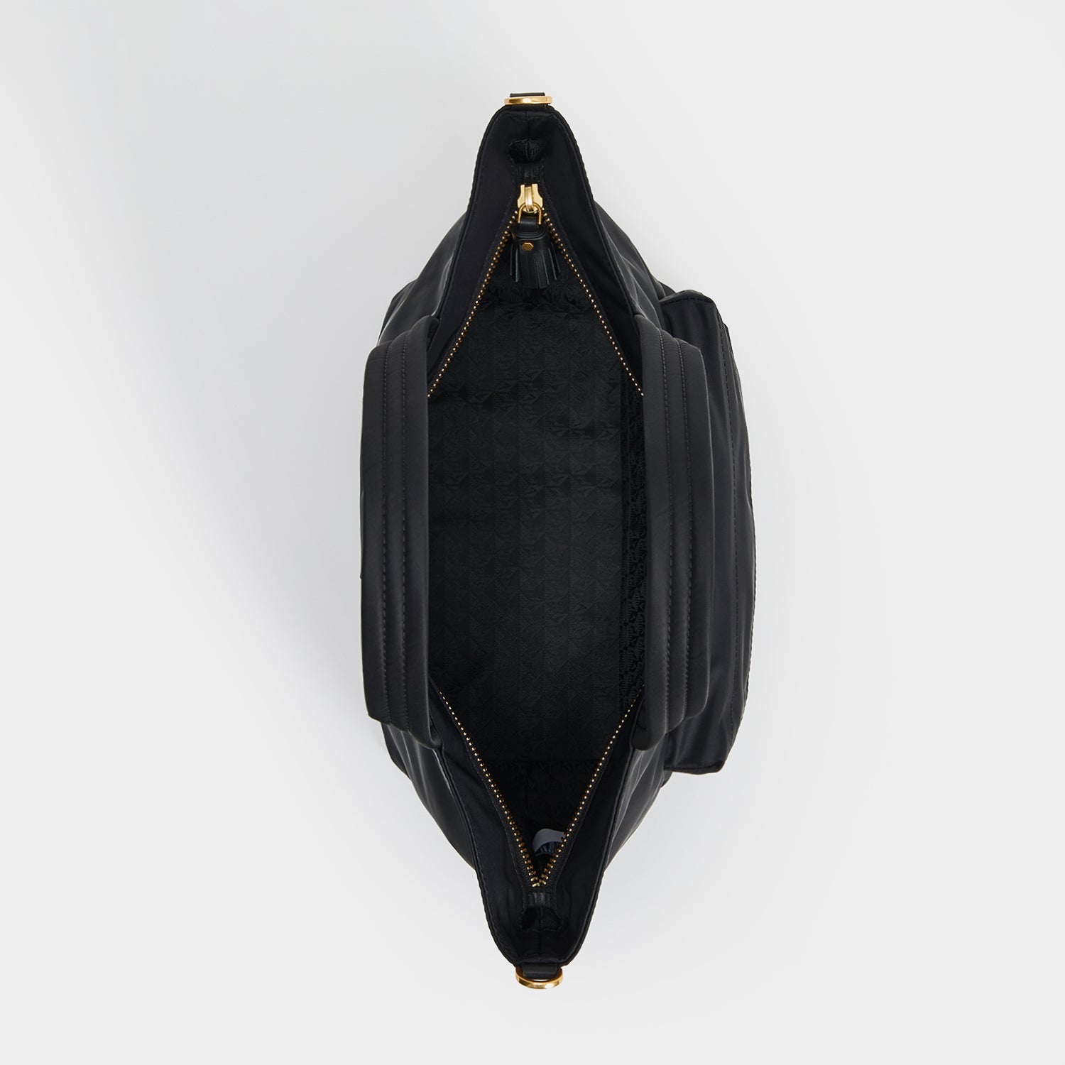 E/W Eyes Mini Cross-body Tote -

          
            Regenerated ECONYL® in Black -
          

          Anya Hindmarch EU
