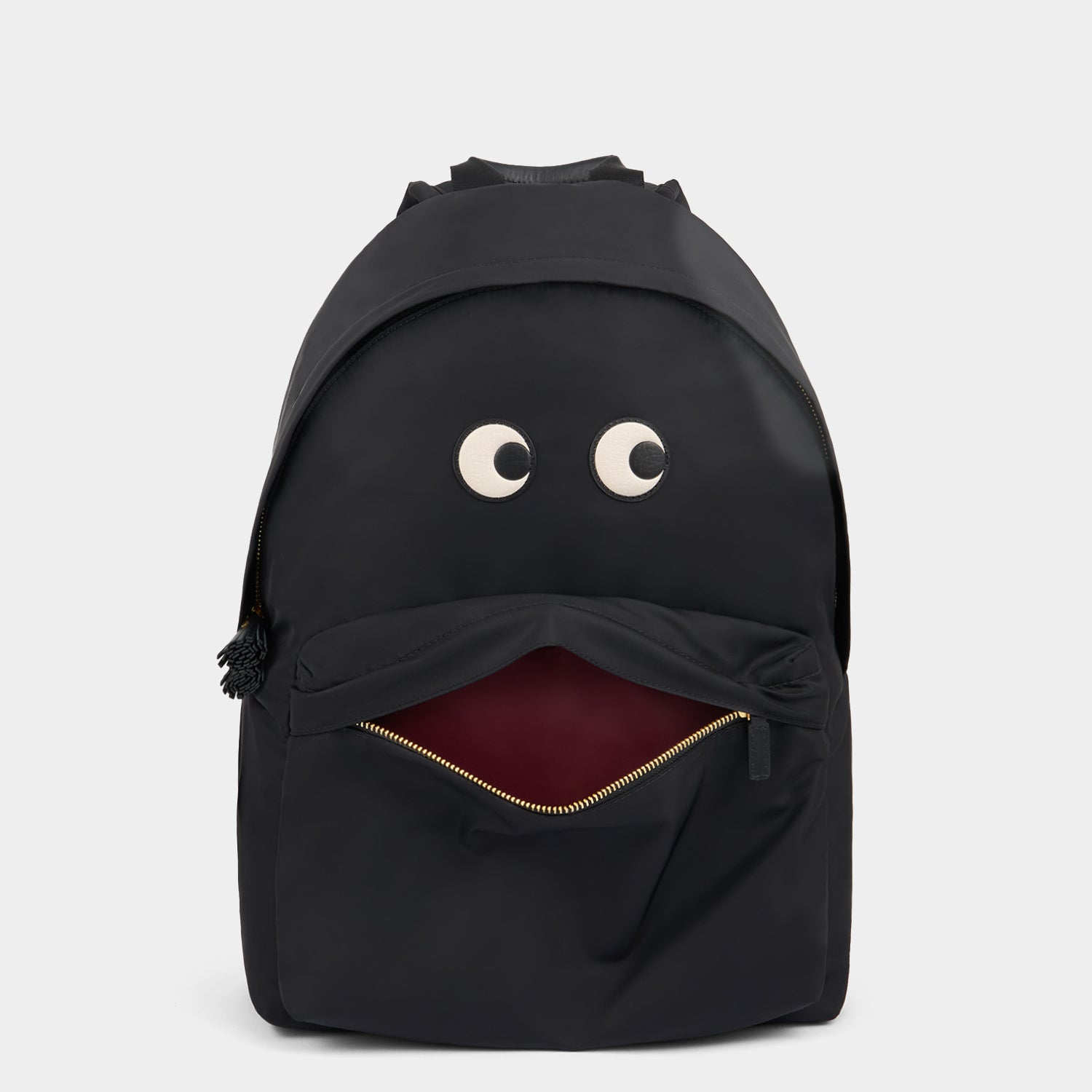 Eyes Backpack -

          
            Regenerated ECONYL® Nylon in Black -
          

          Anya Hindmarch EU
