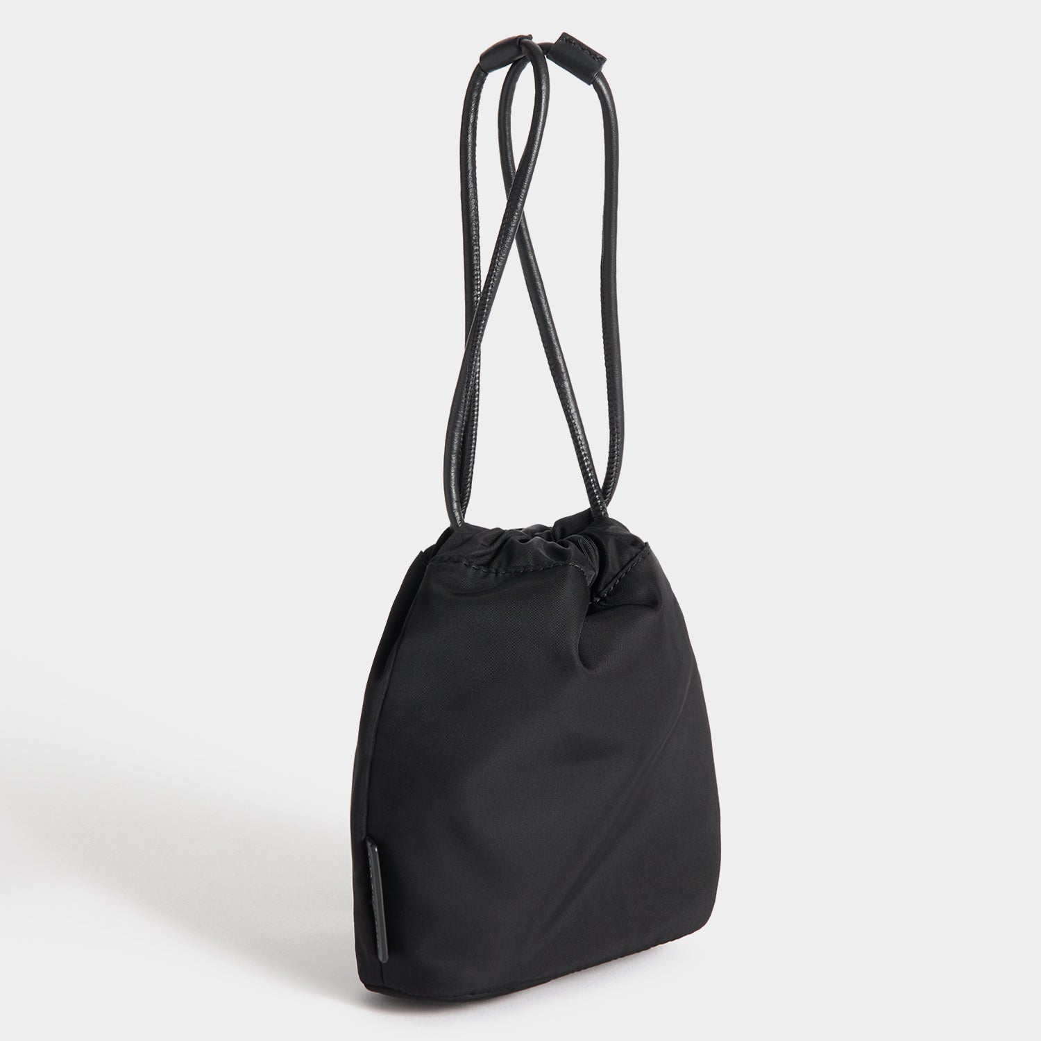 Eyes Drawstring Pouch -

          
            Regenerated ECONYL® in Black -
          

          Anya Hindmarch EU
