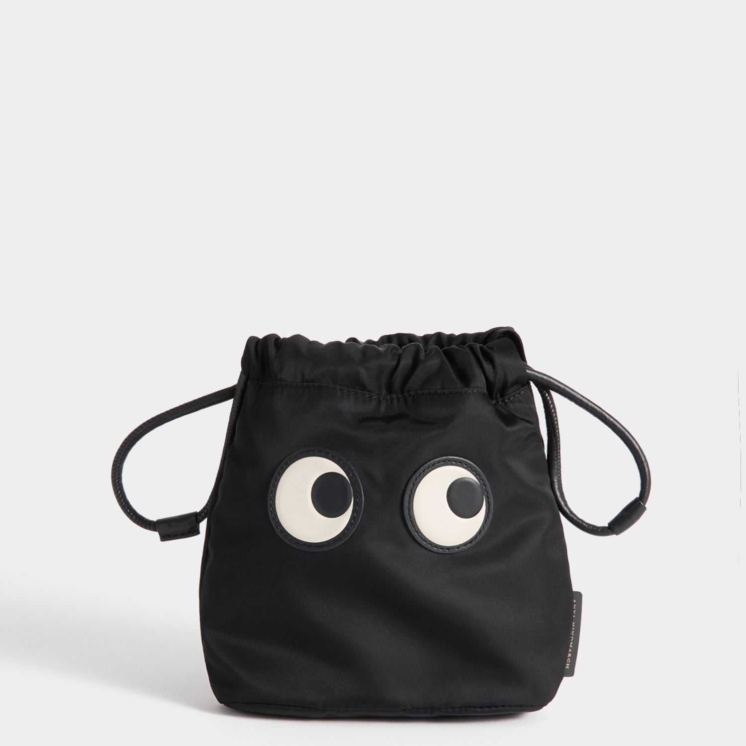 Eyes Drawstring Pouch -

          
            Regenerated ECONYL® in Black -
          

          Anya Hindmarch EU
