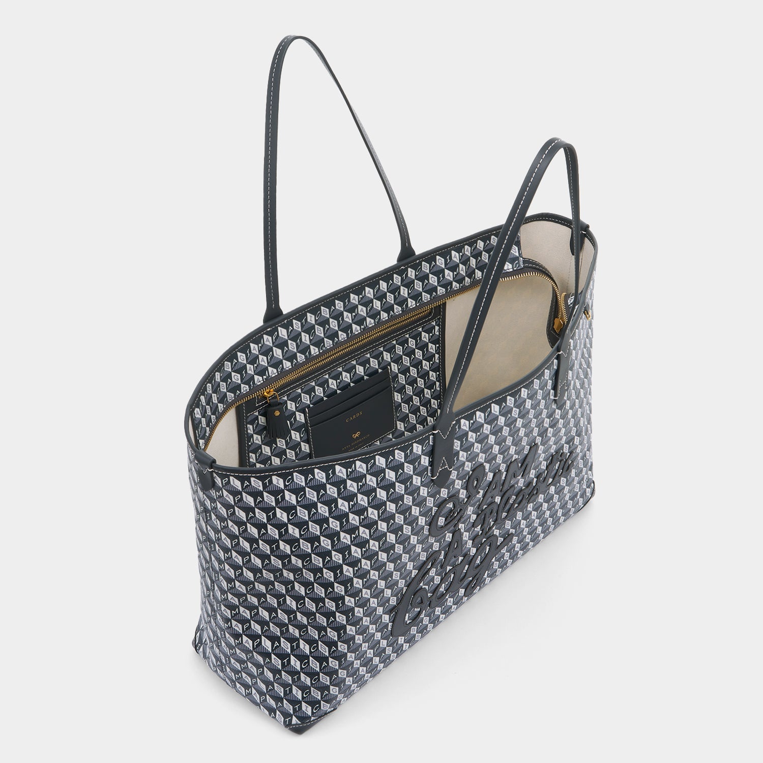 I Am A Plastic Bag Zipped Motif Tote -

          
            Recycled Canvas in Charcoal -
          

          Anya Hindmarch EU

