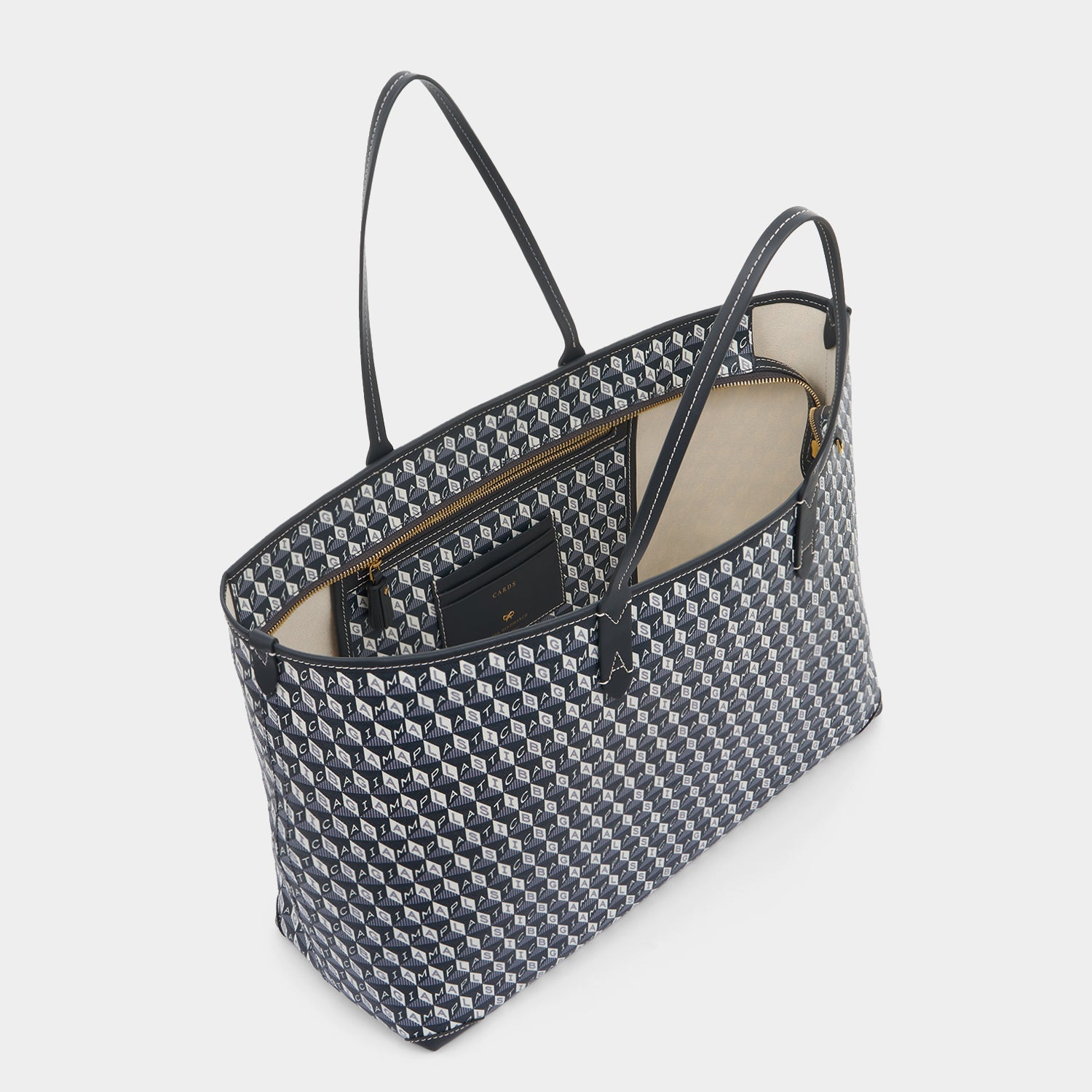 I Am A Plastic Bag Zipped Tote -

          
            Recycled Canvas in Charcoal -
          

          Anya Hindmarch EU
