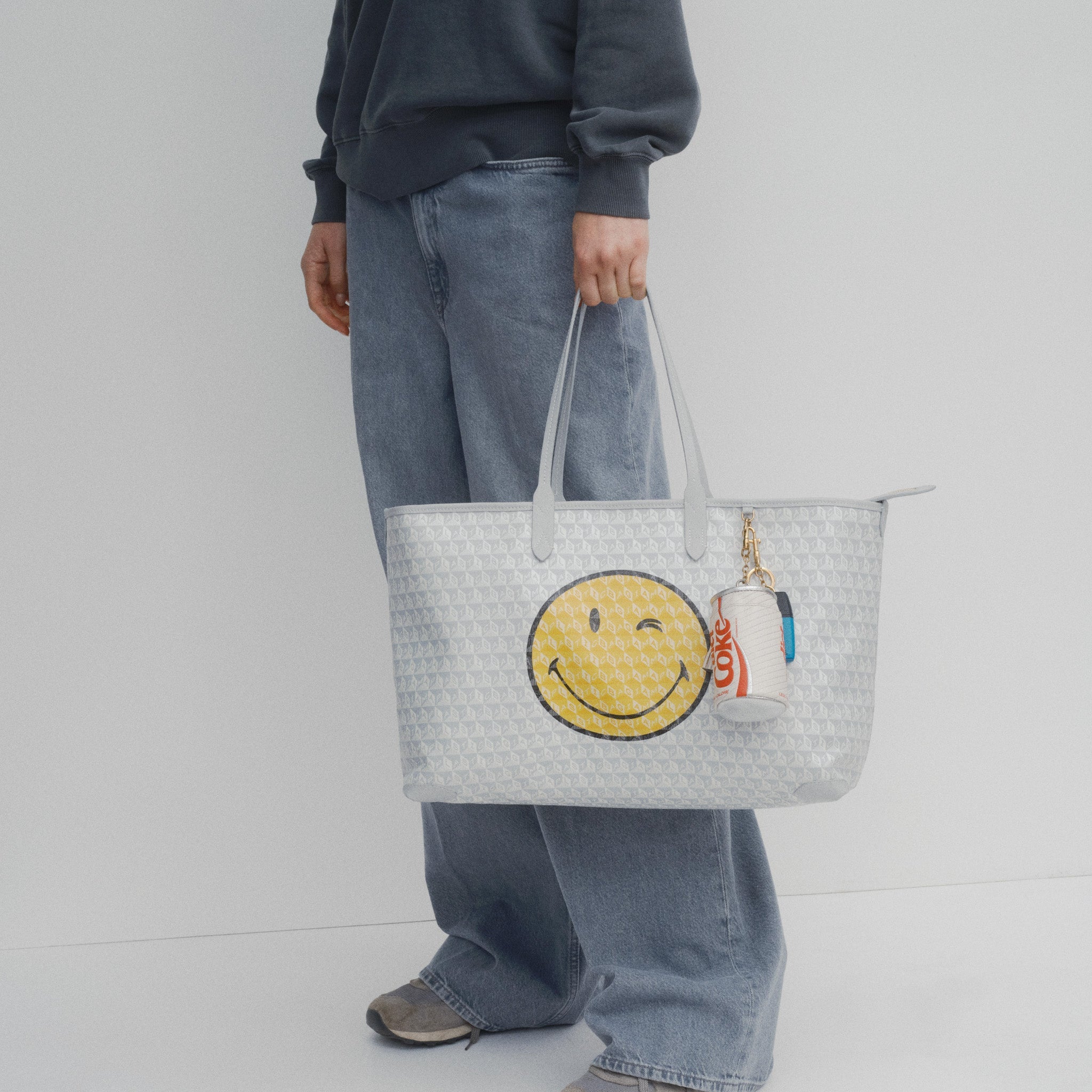 I Am A Plastic Bag Wink Zipped Tote -

          
            Recycled Canvas in Frost -
          

          Anya Hindmarch EU
