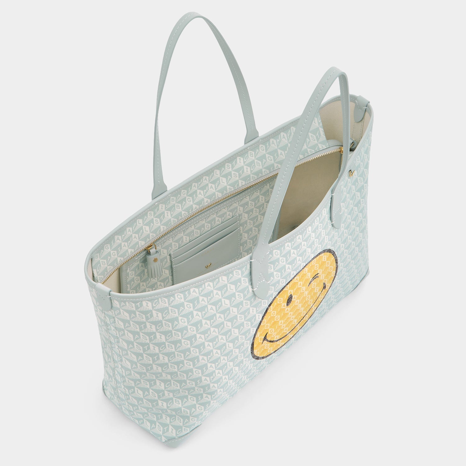 I Am A Plastic Bag Wink Zipped Tote -

          
            Recycled Canvas in Frost -
          

          Anya Hindmarch EU
