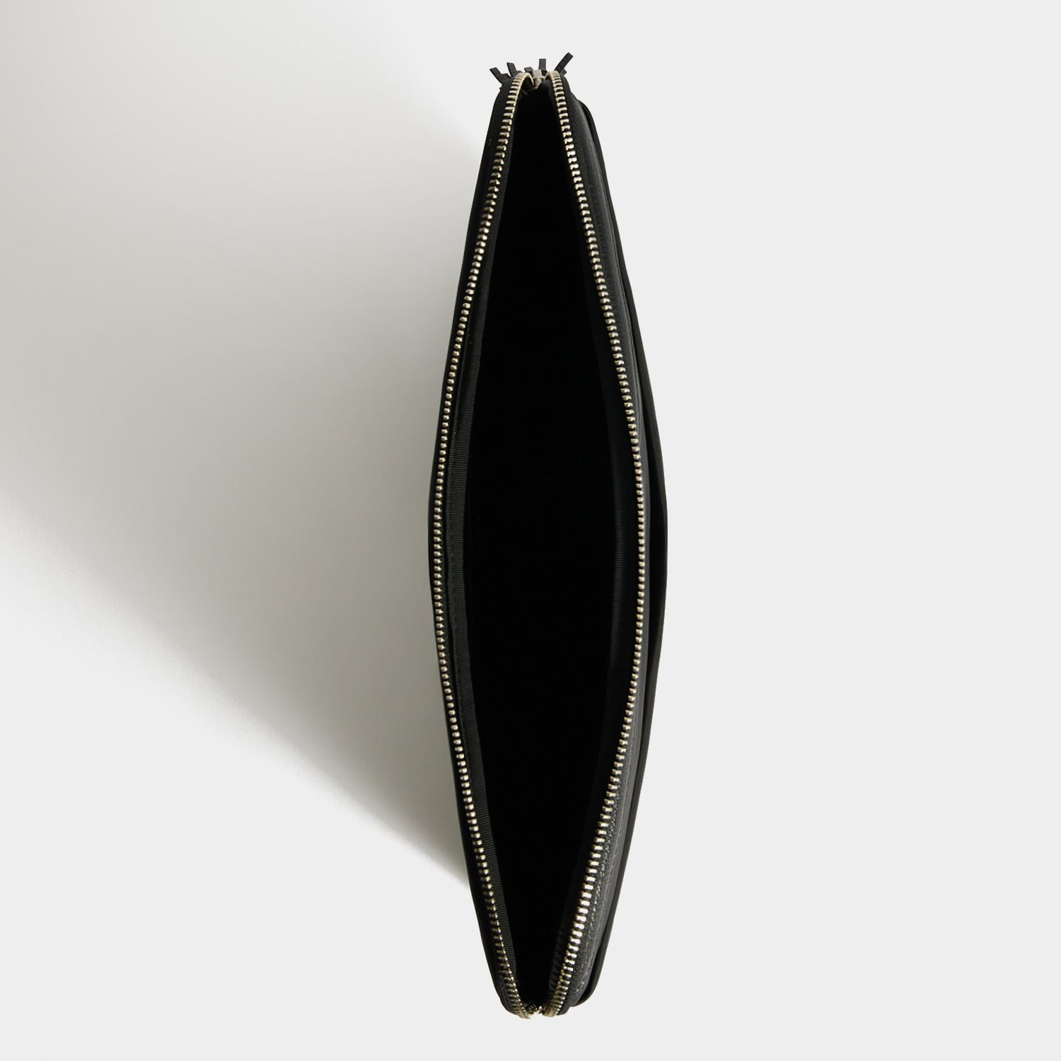 Technology Case -

          
            Regenerated ECONYL® in Black -
          

          Anya Hindmarch EU

