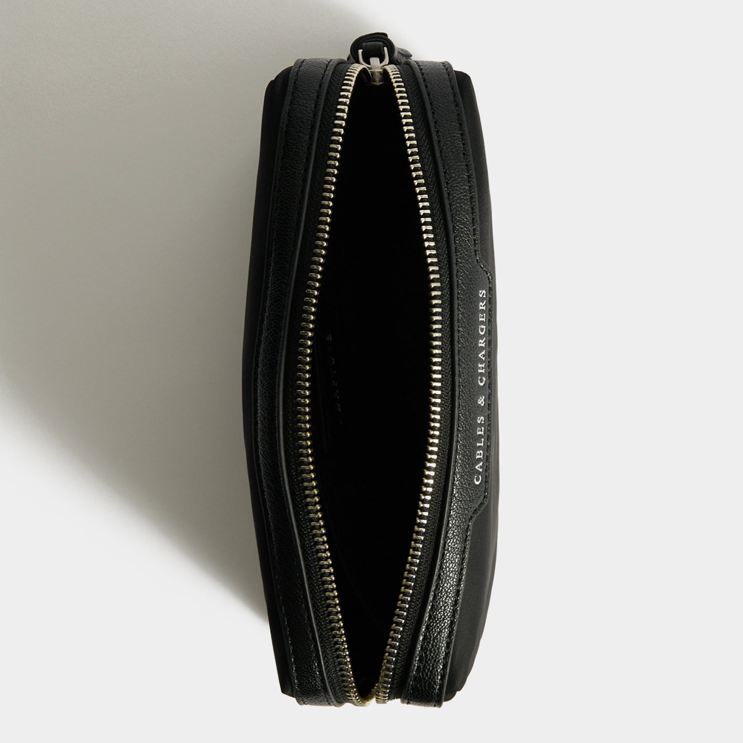Cables & Chargers Pouch -

          
            Regenerated ECONYL® in Black -
          

          Anya Hindmarch EU
