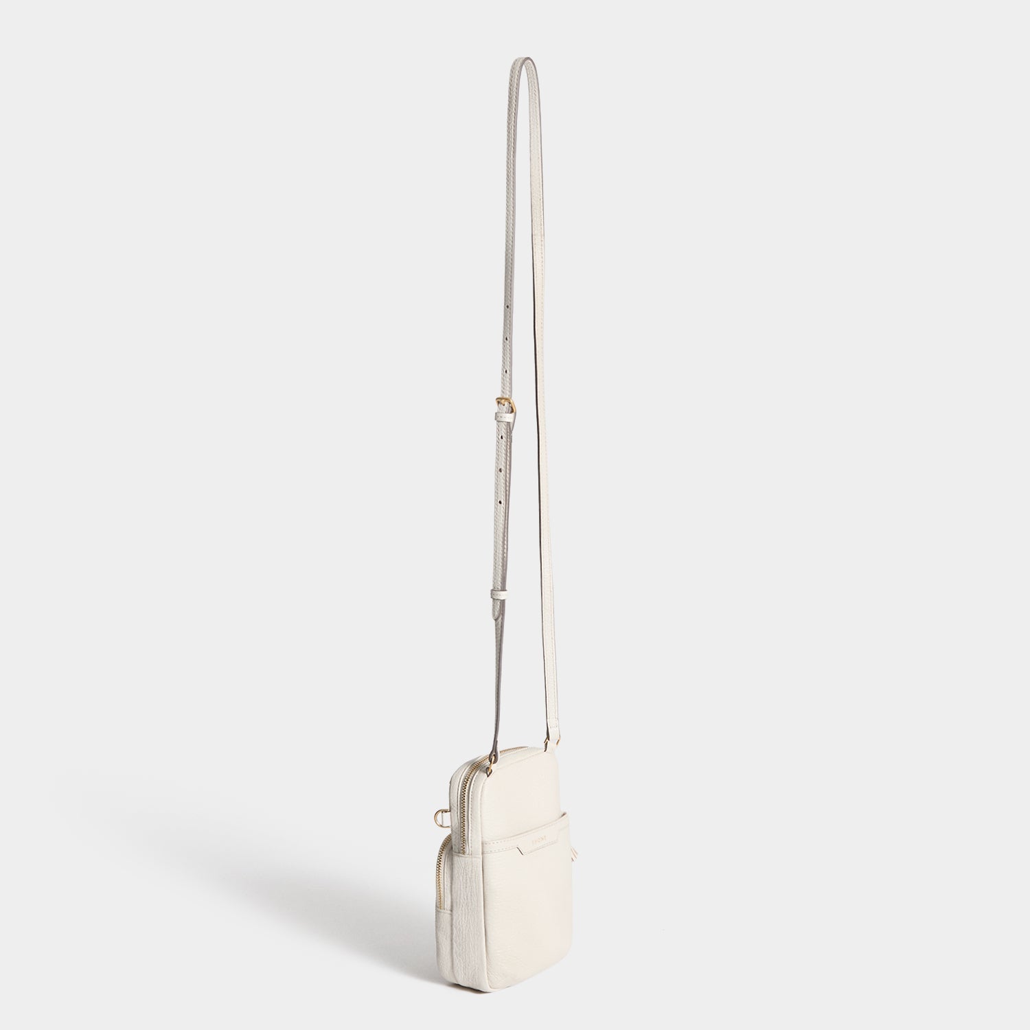 All Over Stickers Essential Cross-body -

          
            Capra Leather in Chalk -
          

          Anya Hindmarch EU
