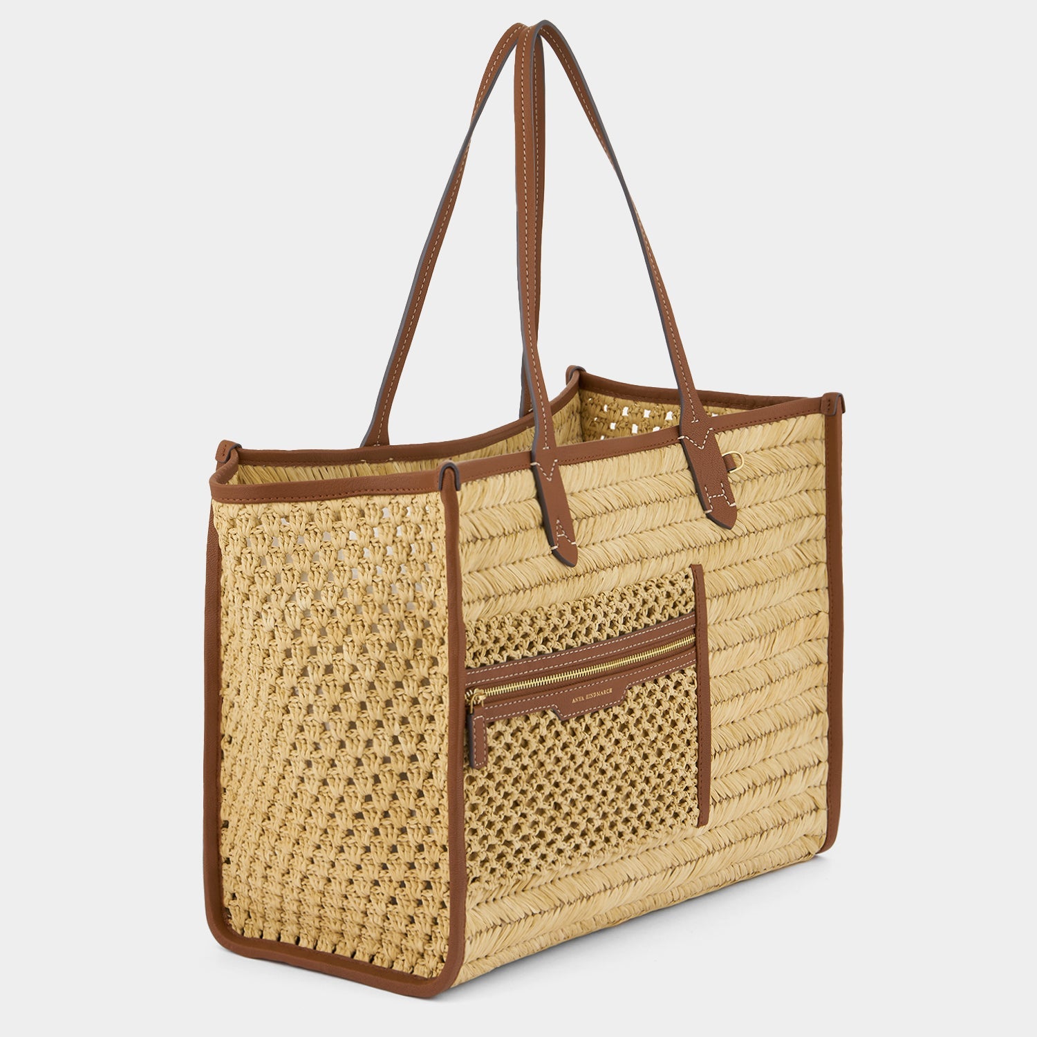 Raffia Pocket Tote -

          
            Raffia in Cedar -
          

          Anya Hindmarch EU
