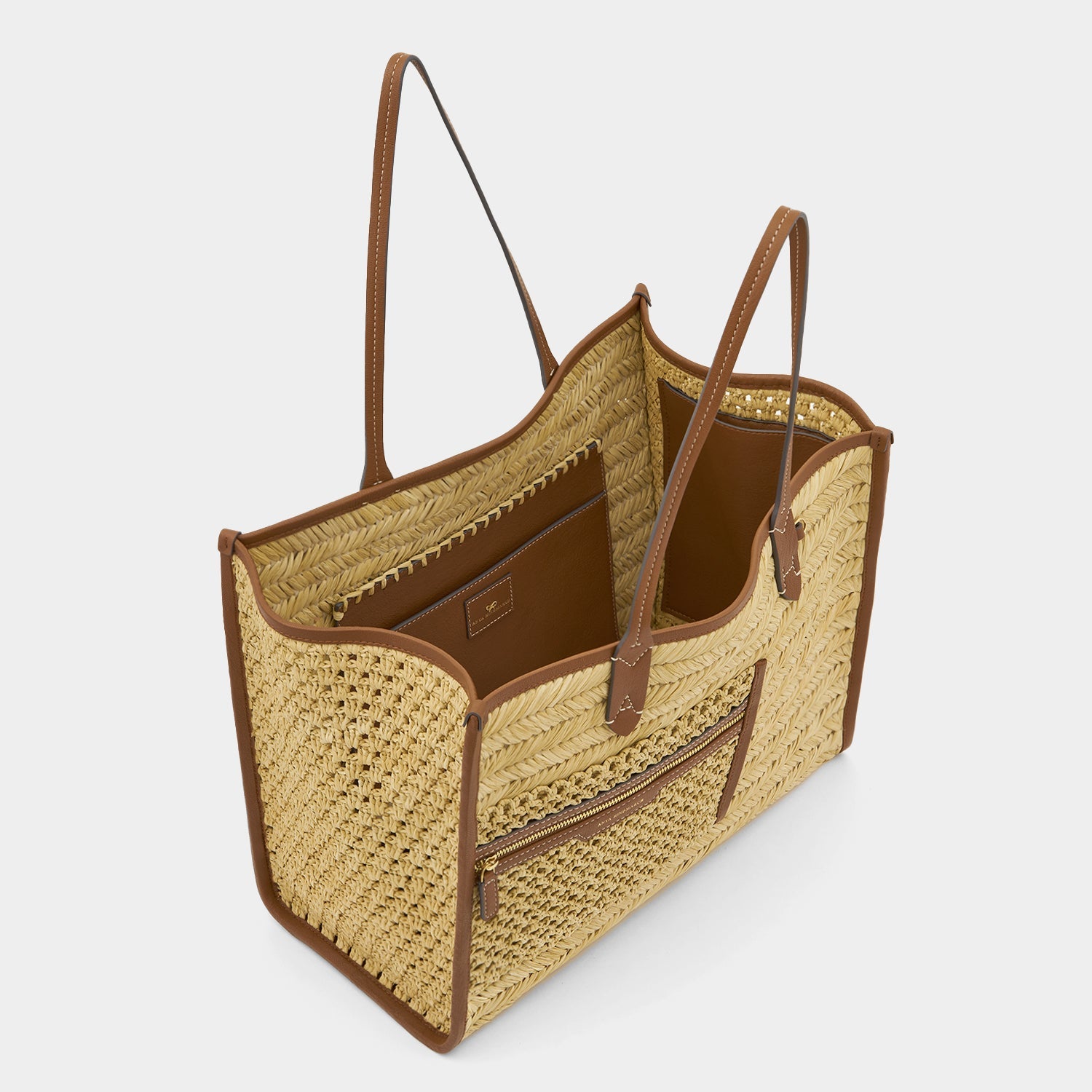 Raffia Pocket Tote -

          
            Raffia in Cedar -
          

          Anya Hindmarch EU
