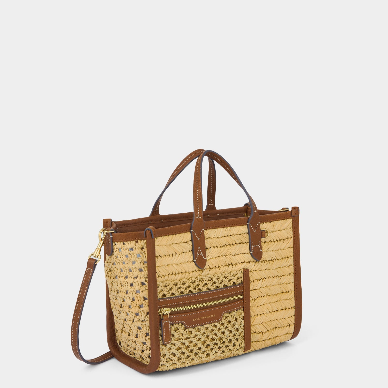 Raffia Pocket XS Cross-body Tote -

          
            Raffia in Cedar -
          

          Anya Hindmarch EU
