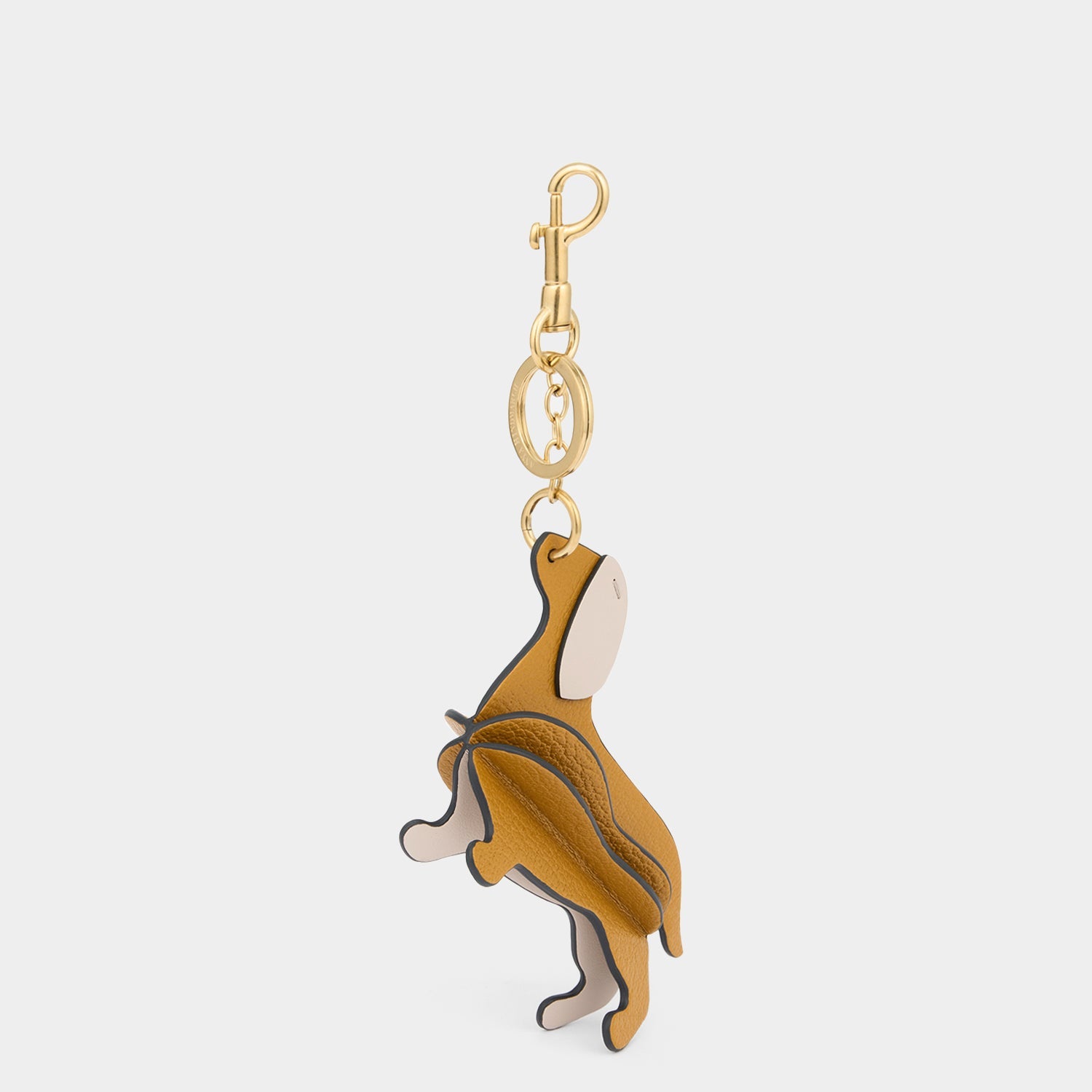 Dog Charm -

          
            Capra Leather in Tumeric -
          

          Anya Hindmarch EU
