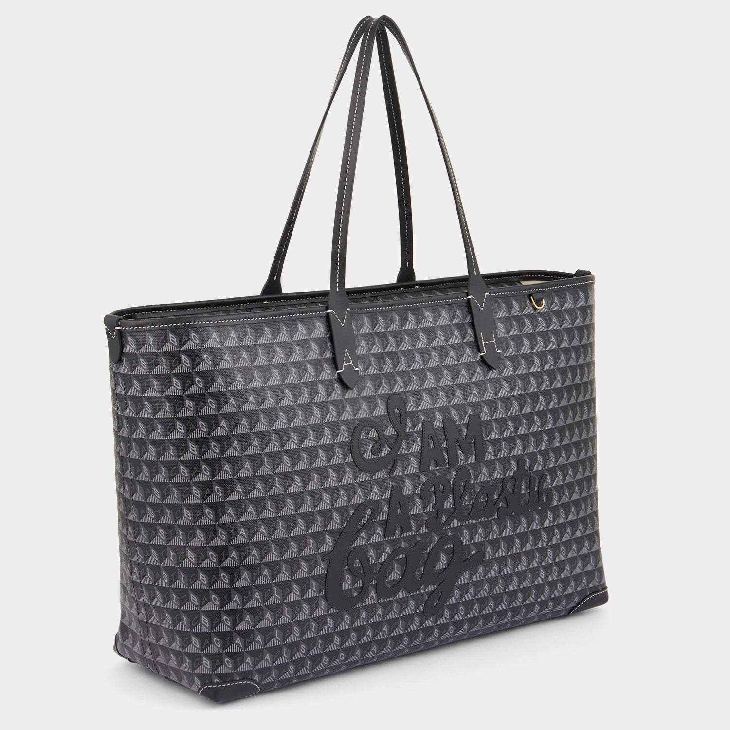 I Am A Plastic Bag Zipped Motif Tote -

          
            Recycled Canvas in Black -
          

          Anya Hindmarch EU
