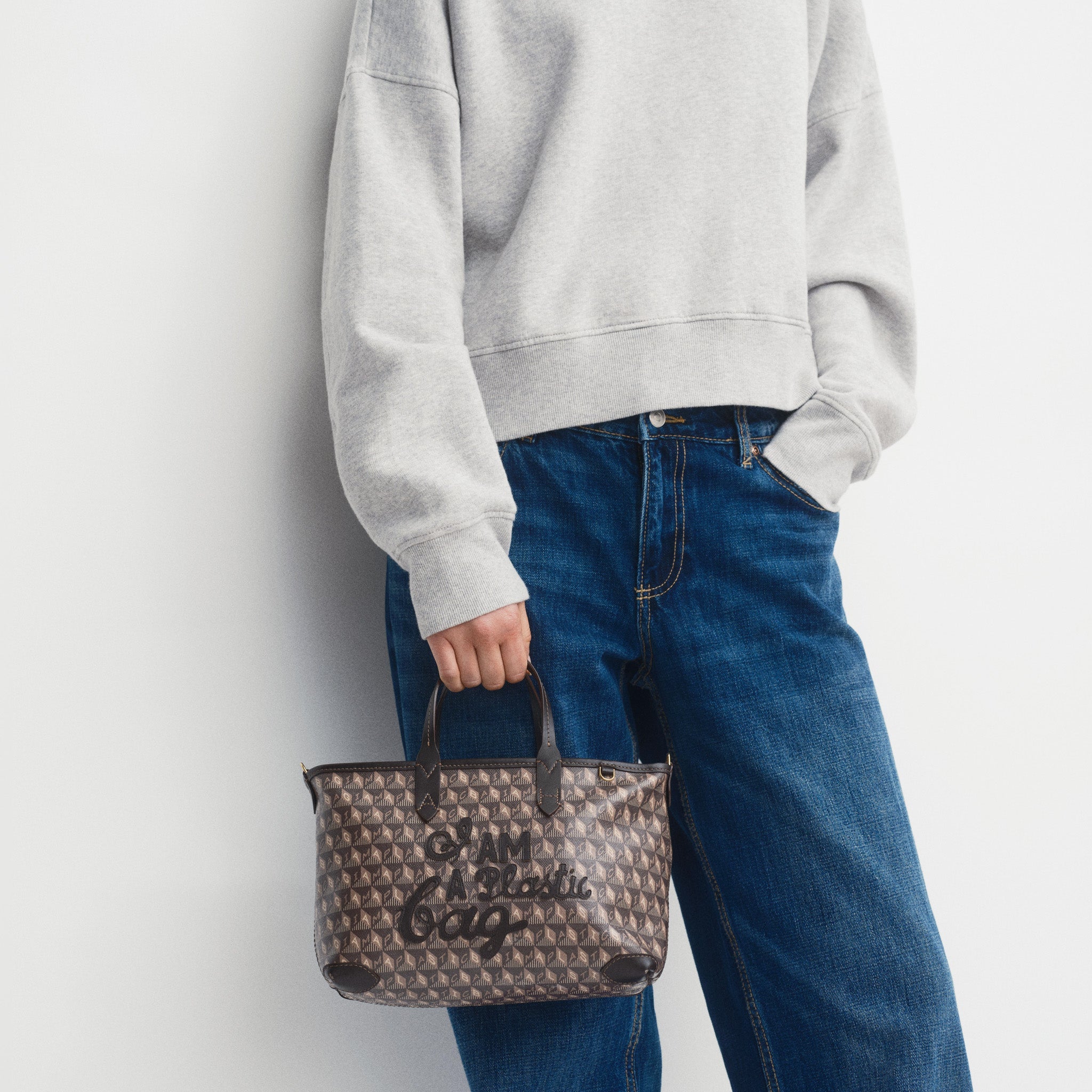 I Am A Plastic Bag XS Zipped Motif Cross-body Tote -

          
            Recycled Canvas in Truffle -
          

          Anya Hindmarch EU
