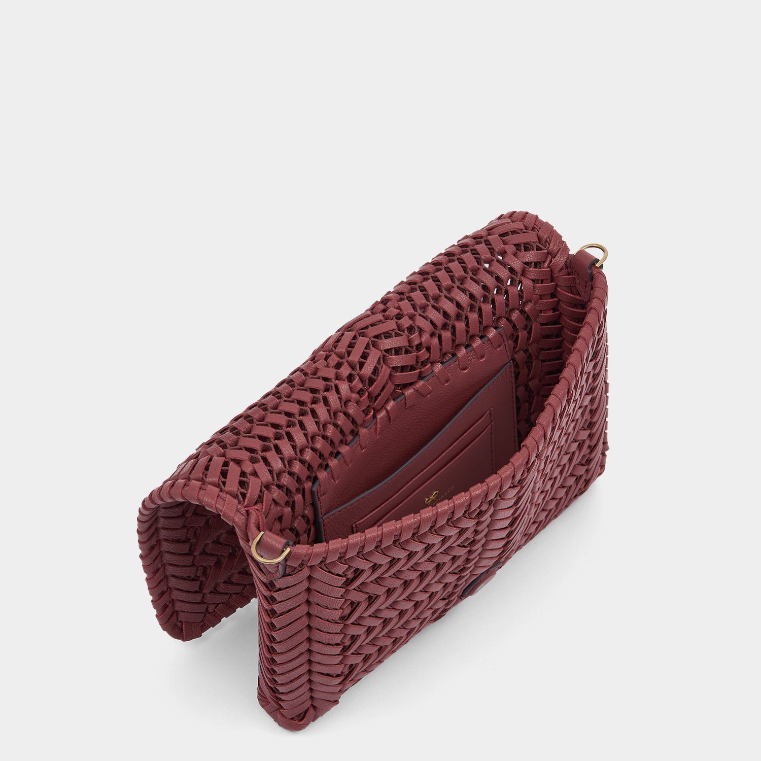 Neeson Cross-body -

          
            Capra Leather in Damson -
          

          Anya Hindmarch EU
