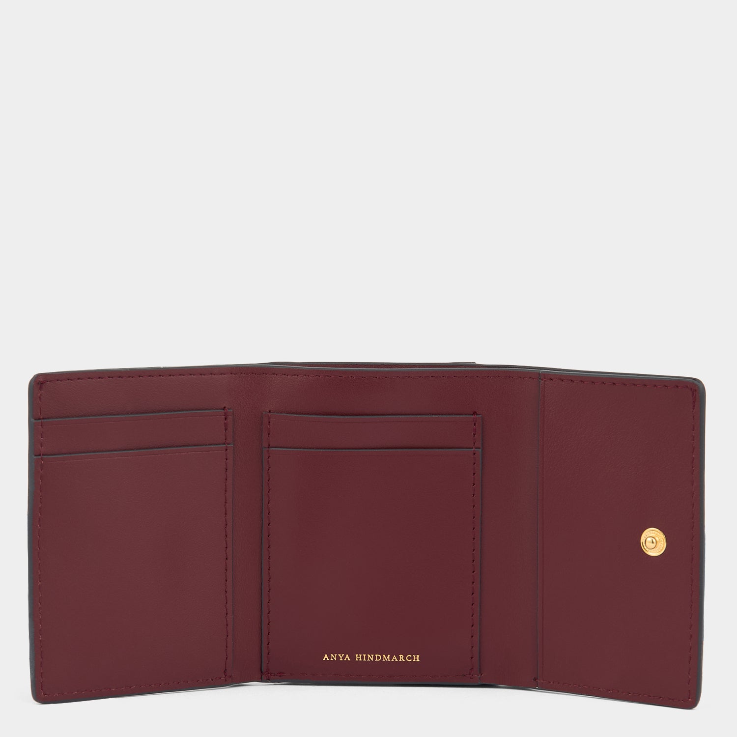 Zany Mini Trifold Wallet -

          
            Capra Leather in Grape -
          

          Anya Hindmarch EU
