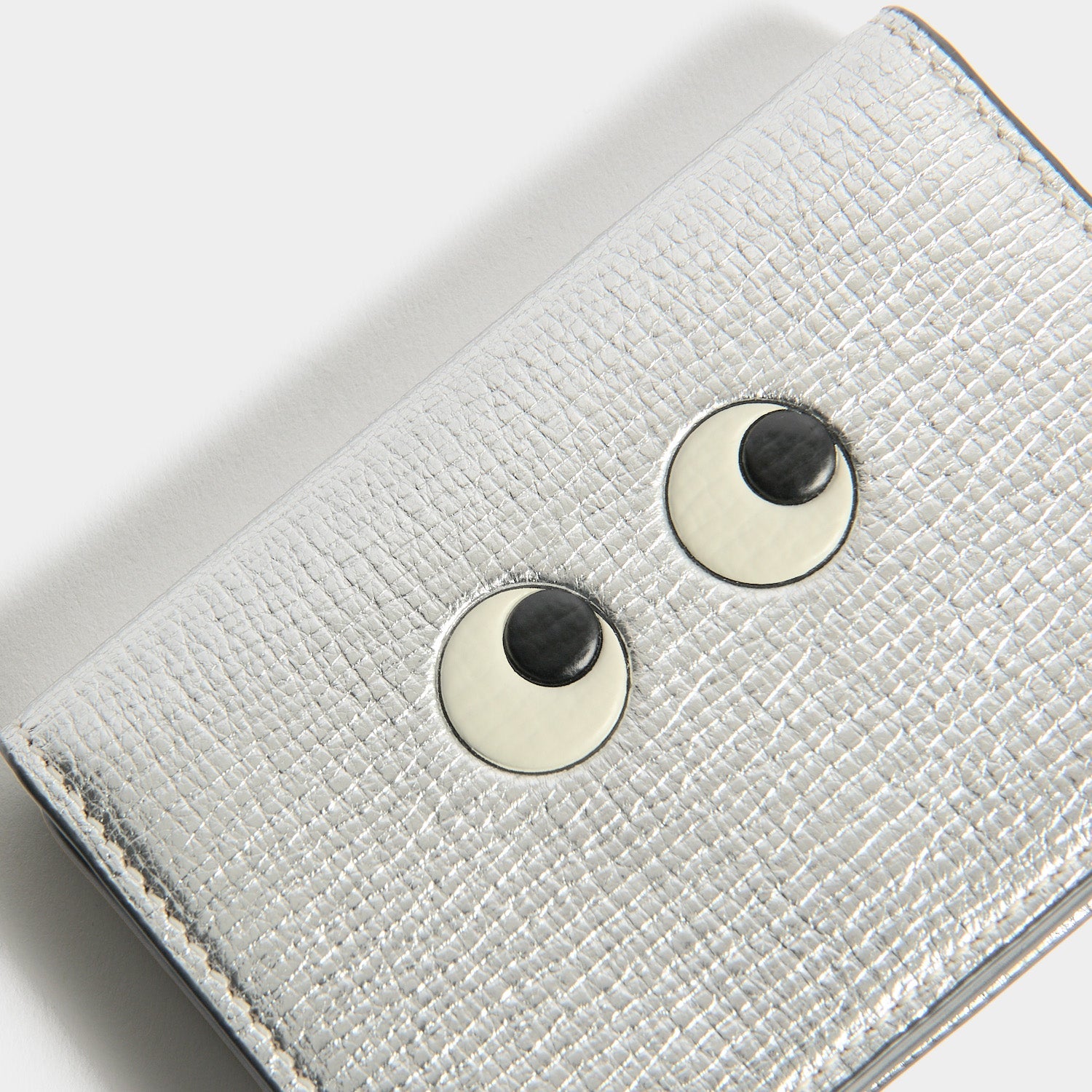 Eyes Card Case -

          
            Capra Leather in Metallic Silver -
          

          Anya Hindmarch EU
