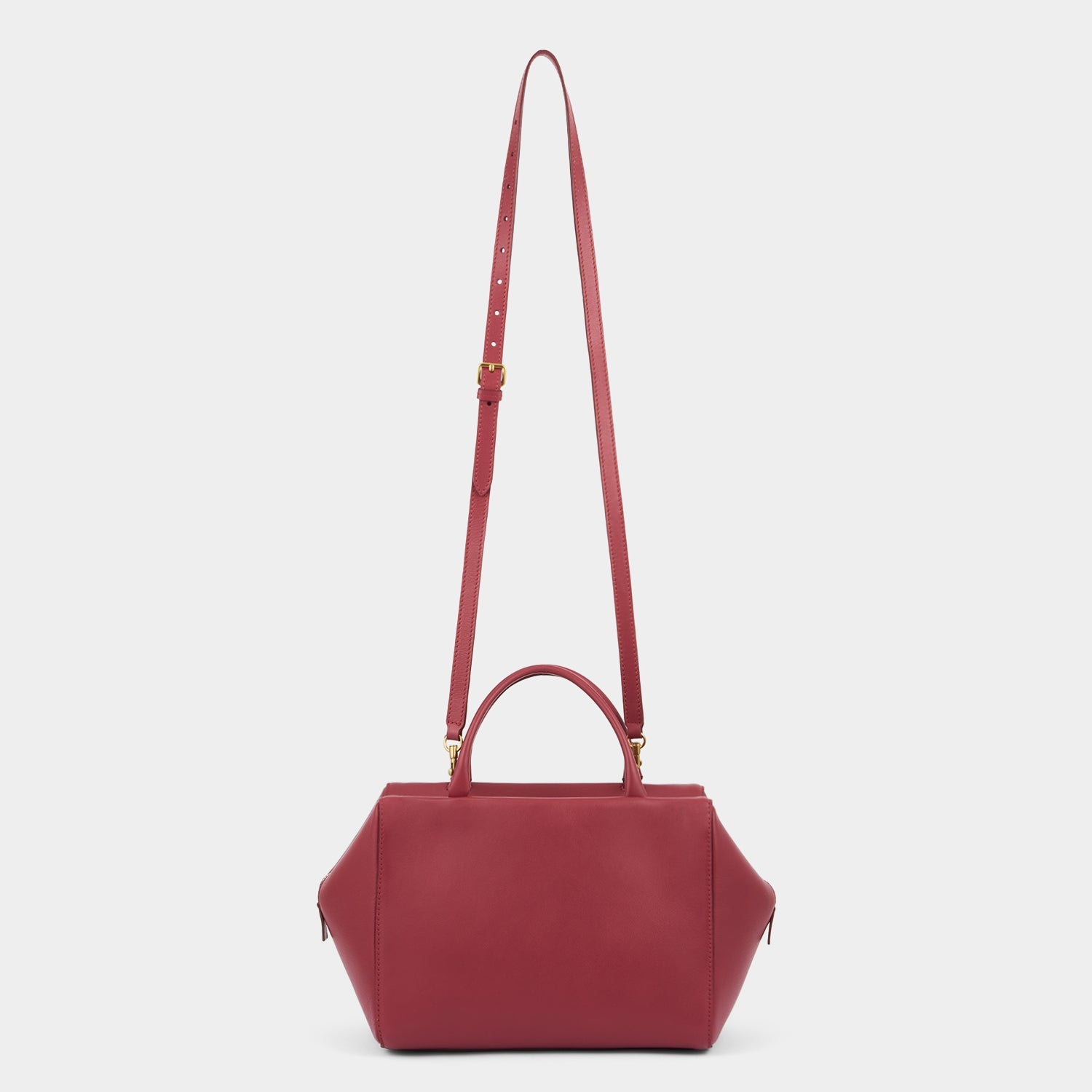 Seaton Cross-body -

          
            Calf Leather in Damson -
          

          Anya Hindmarch EU
