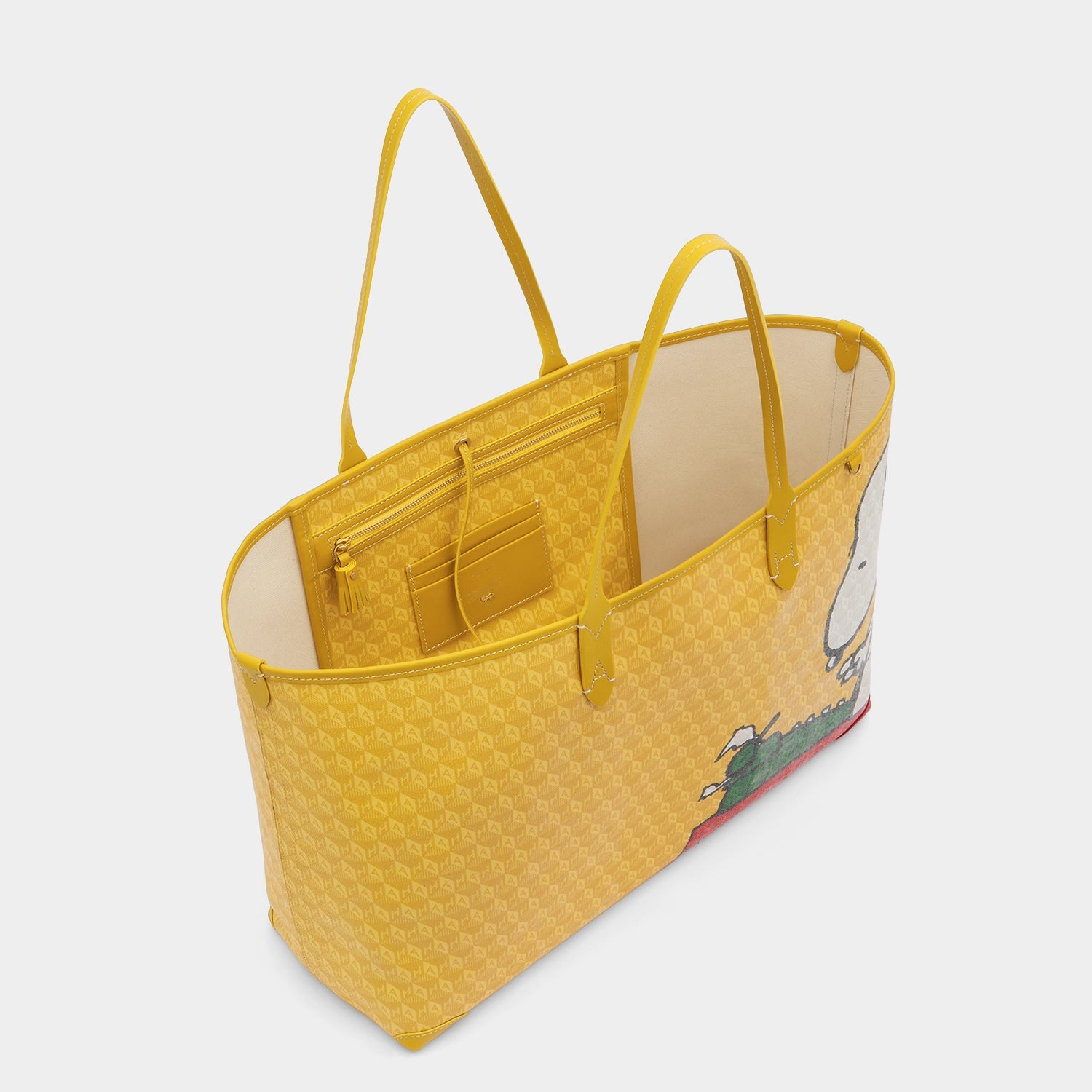 Peanuts I am a Plastic Bag Snoopy Tote -

          
            Recycled Canvas in Mustard -
          

          Anya Hindmarch EU
