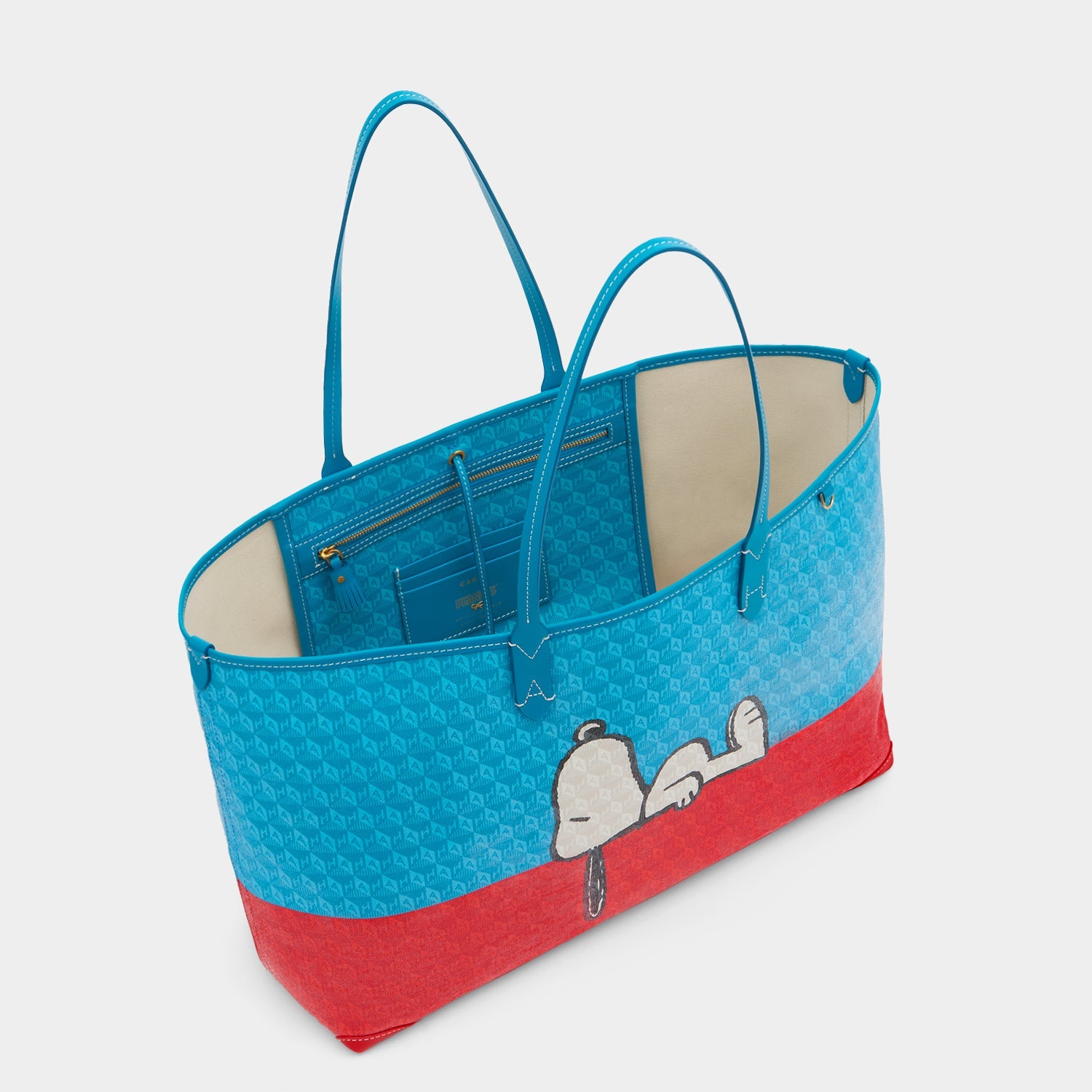 Peanuts I am a Plastic Bag Snoopy Tote -

          
            Recycled Canvas in Bright Petrol Blue -
          

          Anya Hindmarch EU
