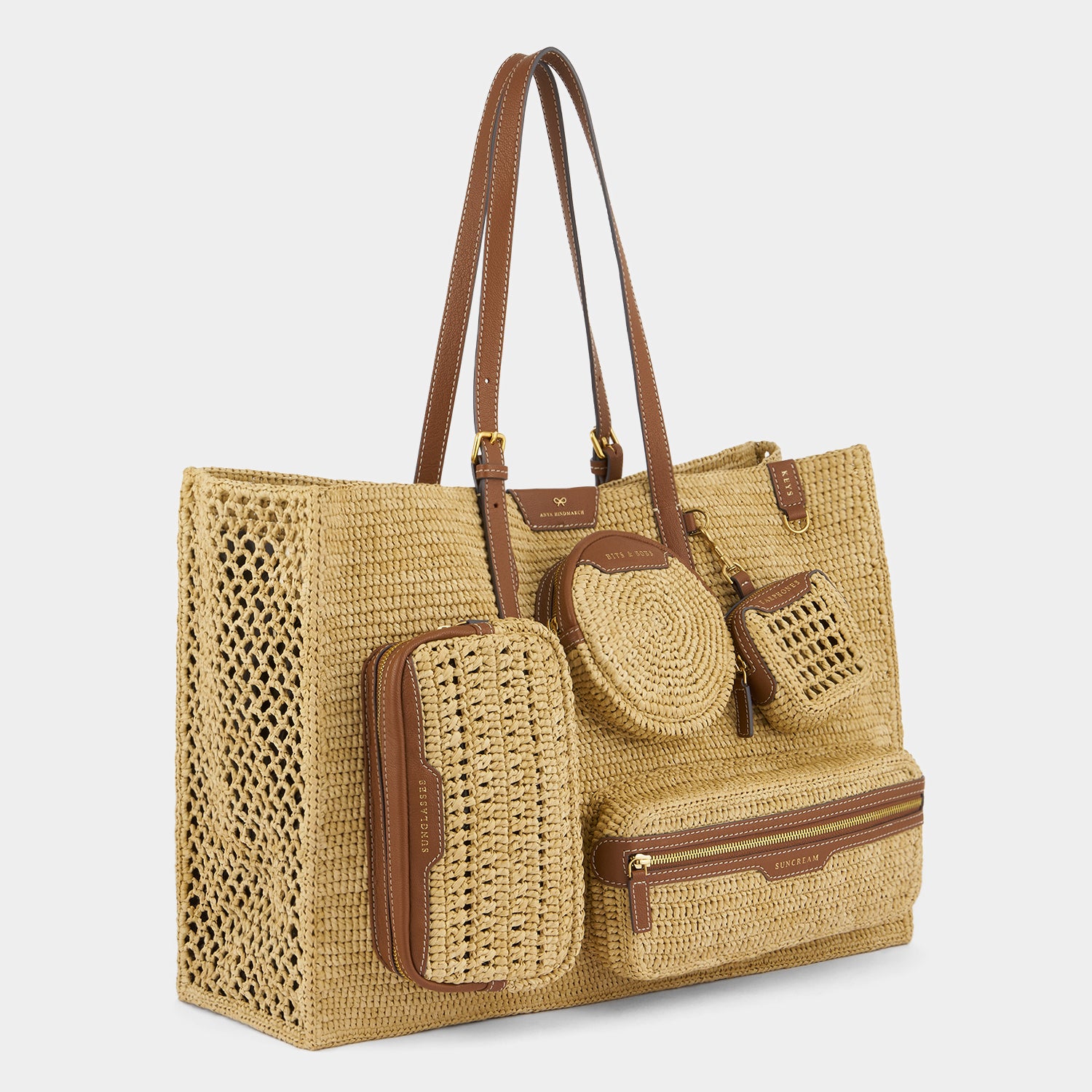 E/W Raffia Holiday Tote -

          
            Raffia in Natural -
          

          Anya Hindmarch EU
