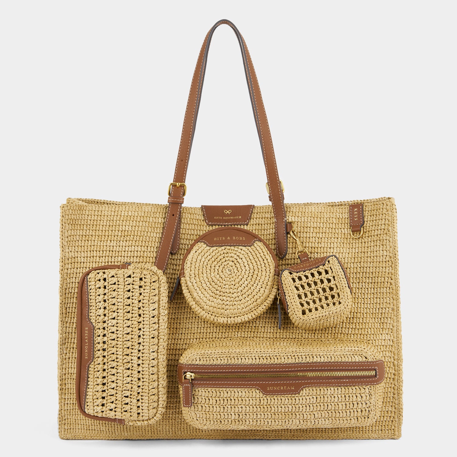 E/W Raffia Holiday Tote -

          
            Raffia in Natural -
          

          Anya Hindmarch EU
