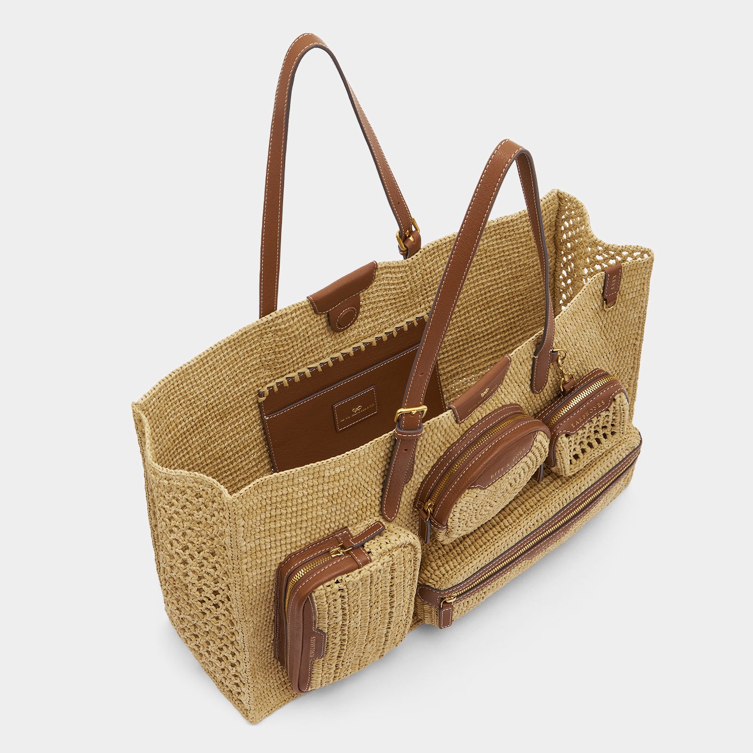 E/W Raffia Holiday Tote -

          
            Raffia in Natural -
          

          Anya Hindmarch EU
