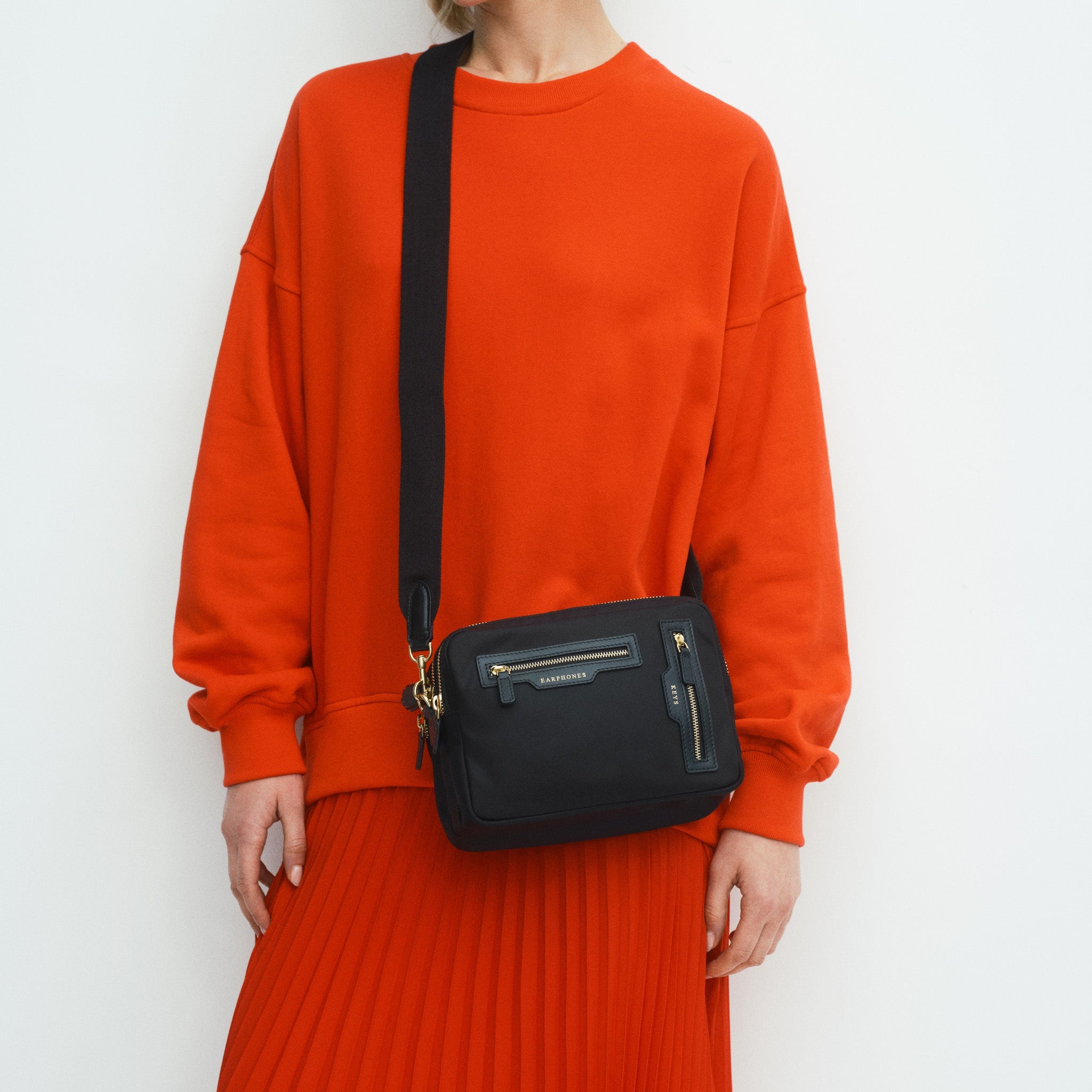 Triple Zip Cross-body -

          
            Regenerated ECONYL® Nylon in Black -
          

          Anya Hindmarch EU
