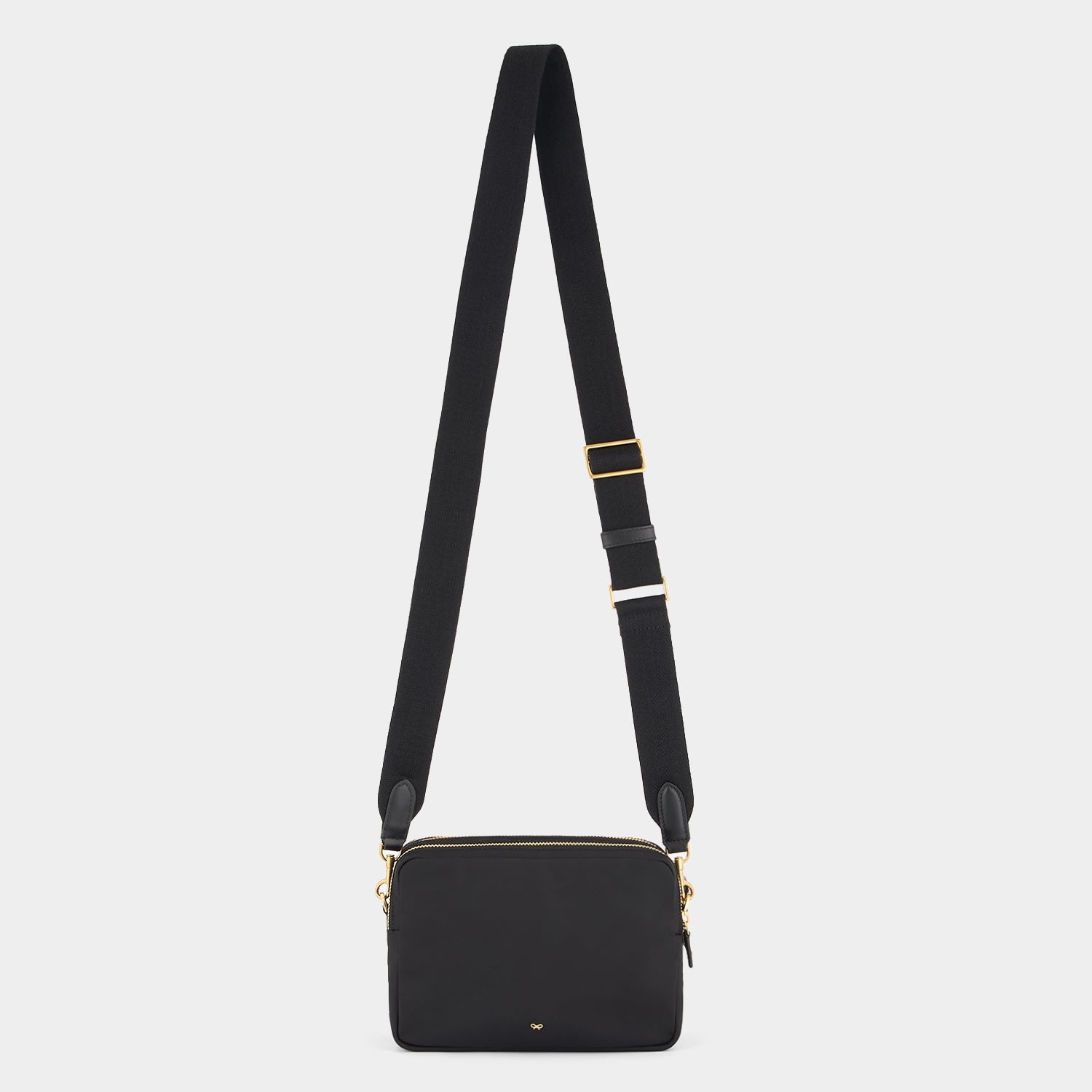 Trio Cross-body -

          
            Regenerated ECONYL® Nylon in Black -
          

          Anya Hindmarch EU
