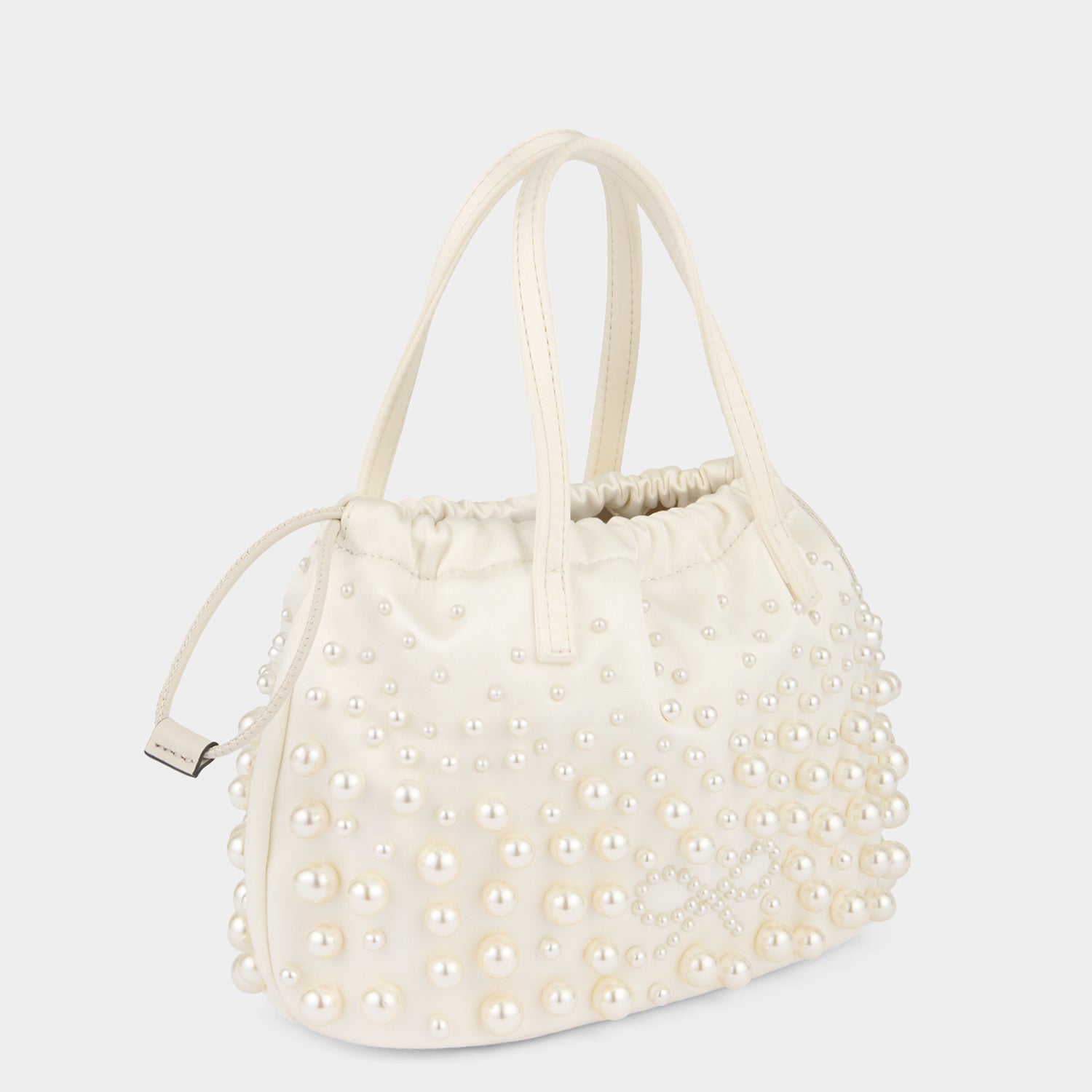 Pearls Drawstring Pouch -

          
            Satin/Suede Leather in Ivory -
          

          Anya Hindmarch EU
