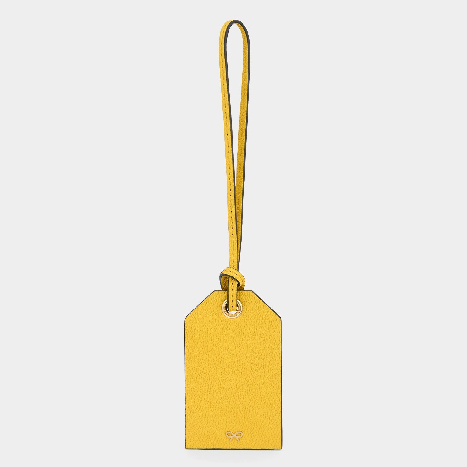 Caution Luggage Label Charm -

          
            Capra Leather in Yellow -
          

          Anya Hindmarch EU
