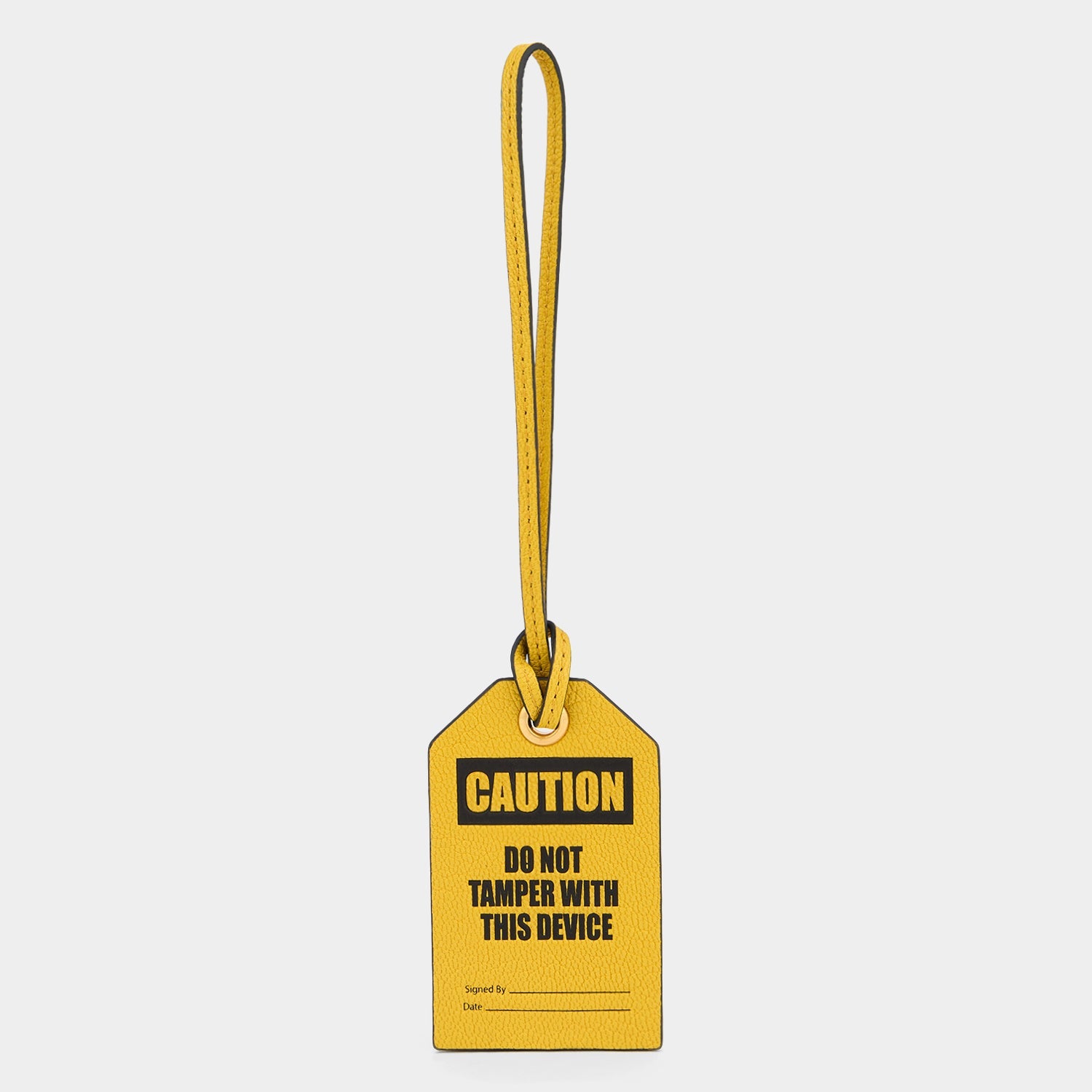 Caution Luggage Label Charm -

          
            Capra Leather in Yellow -
          

          Anya Hindmarch EU
