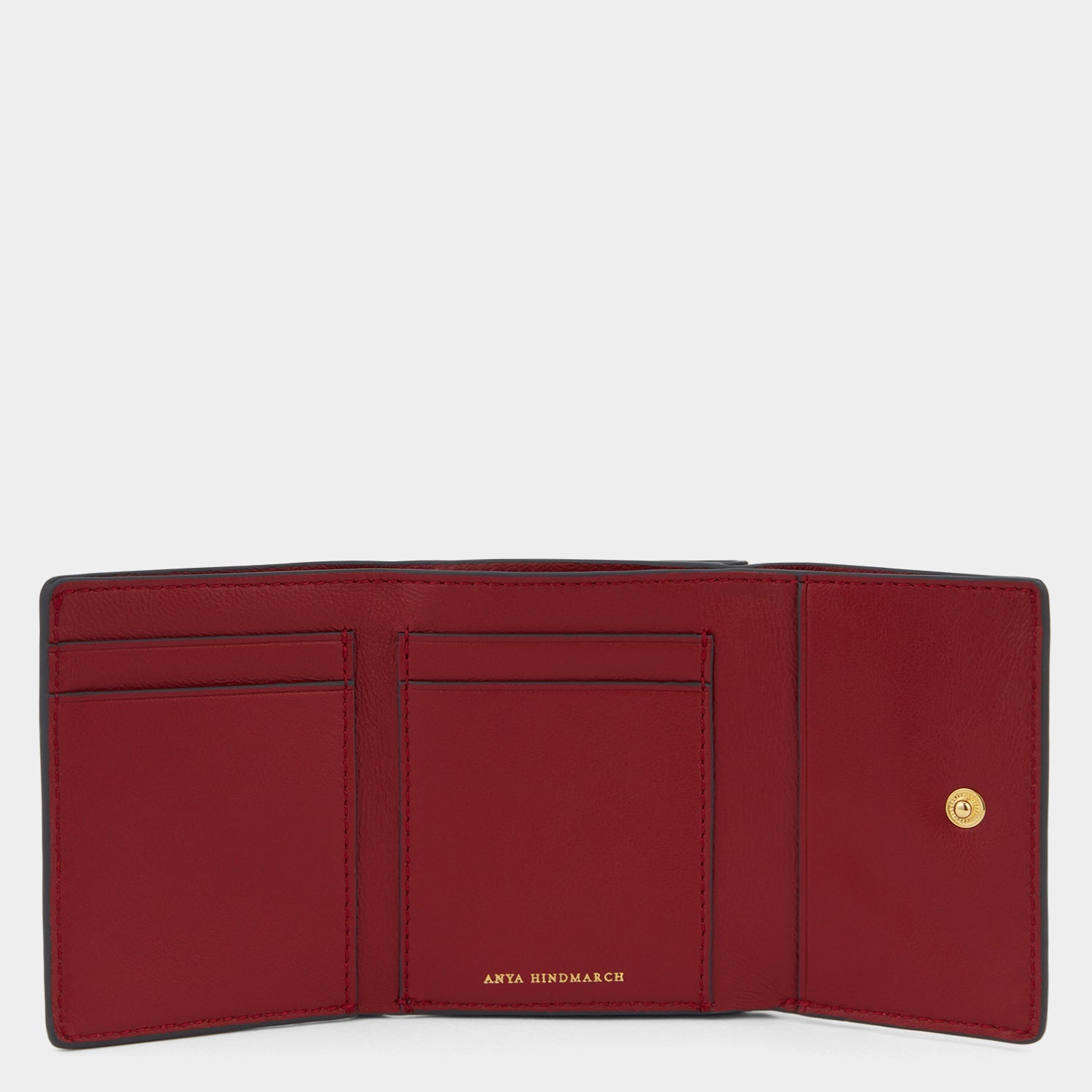 Snake Mini Trifold Wallet -

          
            Capra Leather in Grape -
          

          Anya Hindmarch EU
