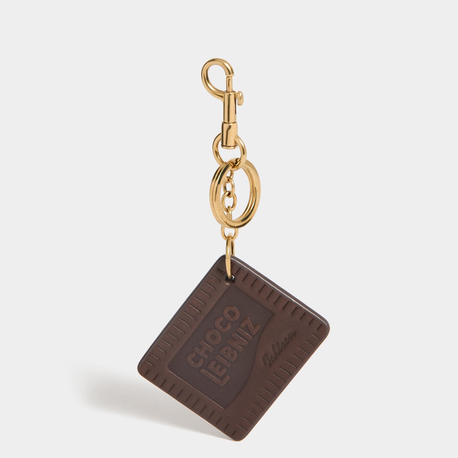 Anya Brands Choco Leibniz Charm -

          
            Capra Leather in Chocolate -
          

          Anya Hindmarch EU
