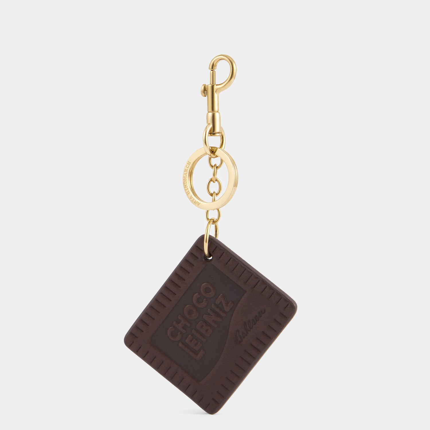 Anya Brands Choco Leibniz Charm -

          
            Capra Leather in Chocolate -
          

          Anya Hindmarch EU
